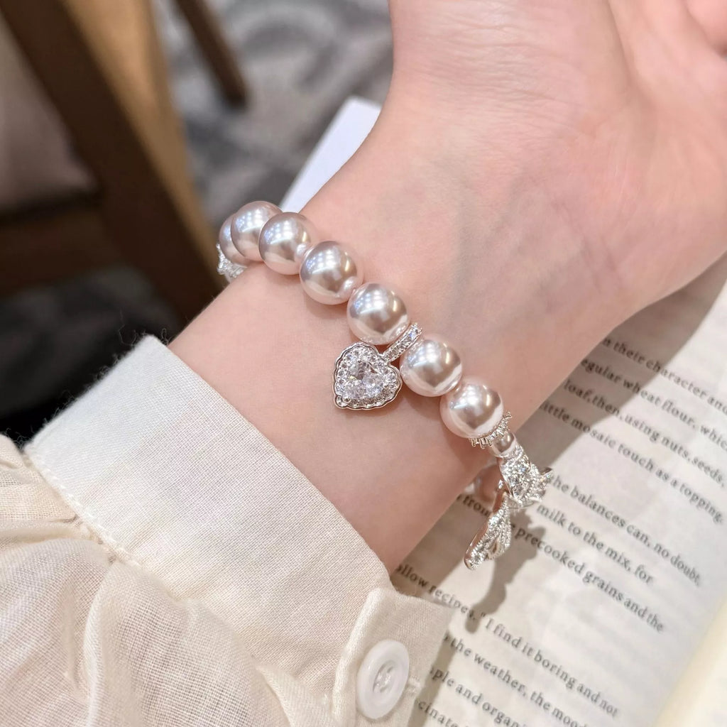 Pearl Bracelet with Bow Charm