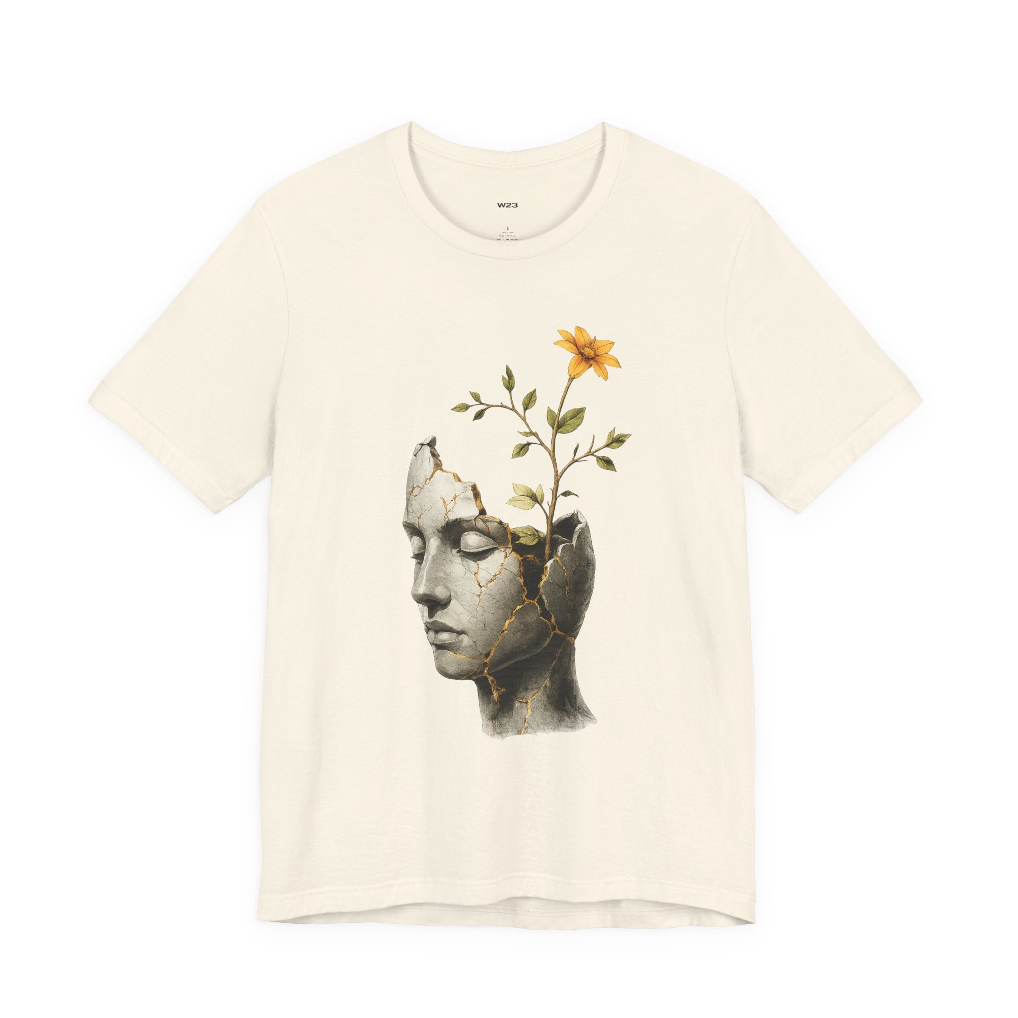SEEN. Still Becoming Tee — Cracked Sculpture, Flower Growth