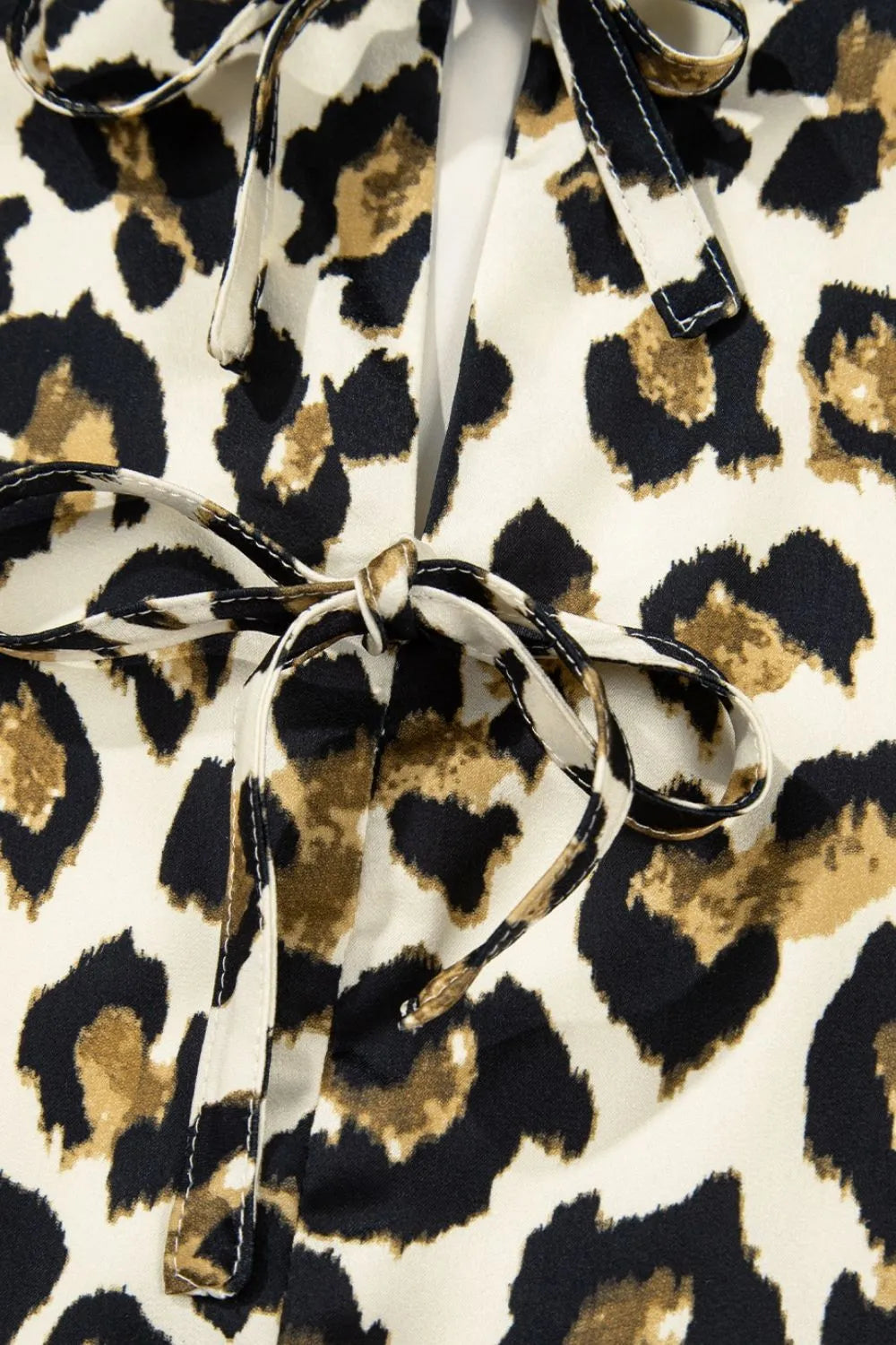 Leopard Bow Tie Front Puff Sleeve Peplum Blouse