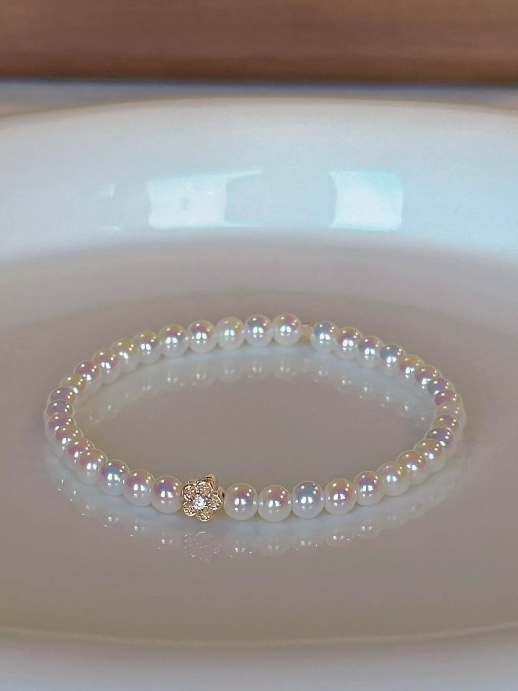 Pearl Bracelet with Floral Accent
