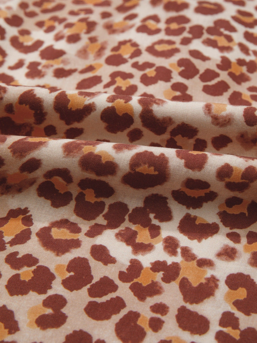 Leopard Print Smocked Notched Blouse