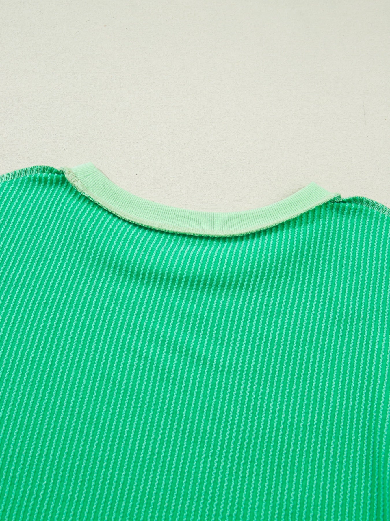 Loose Uneven Hem Twist Ribbed T Shirt