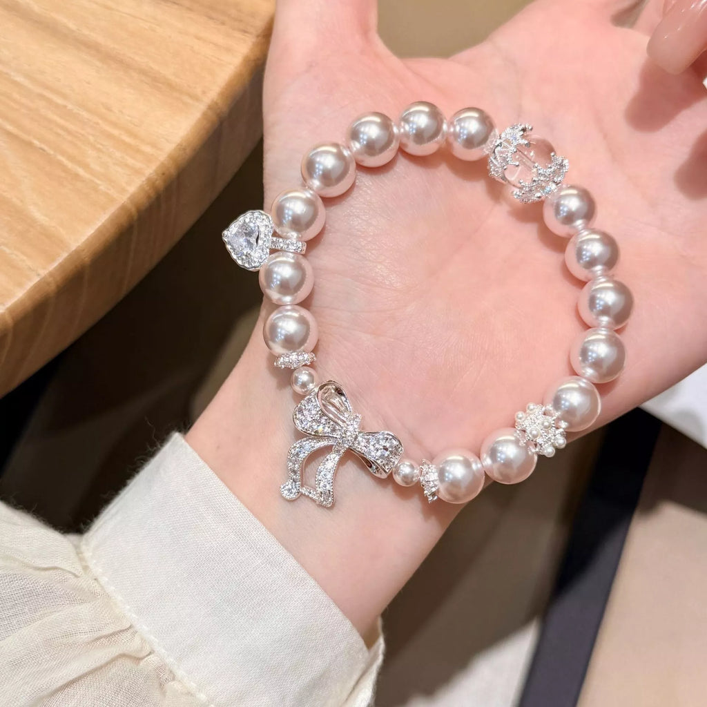 Pearl Bracelet with Bow Charm