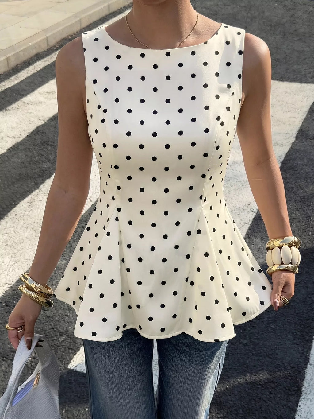Polka Dot Sleeveless Peplum Blouse