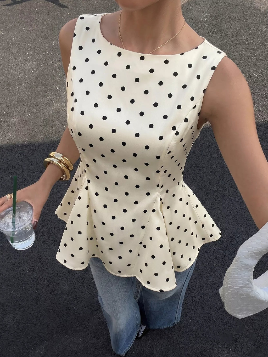 Polka Dot Sleeveless Peplum Blouse