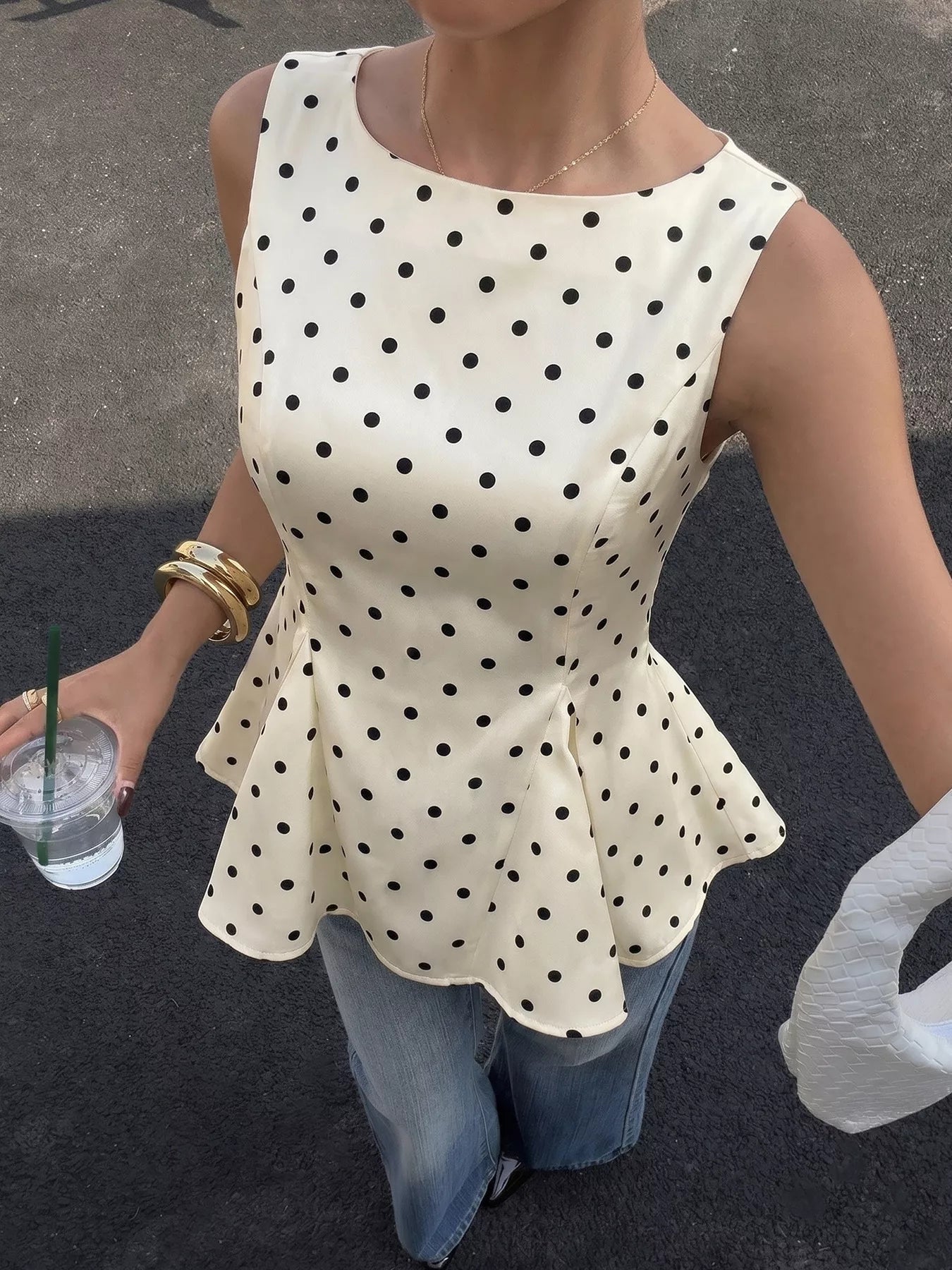 Polka Dot Sleeveless Peplum Blouse