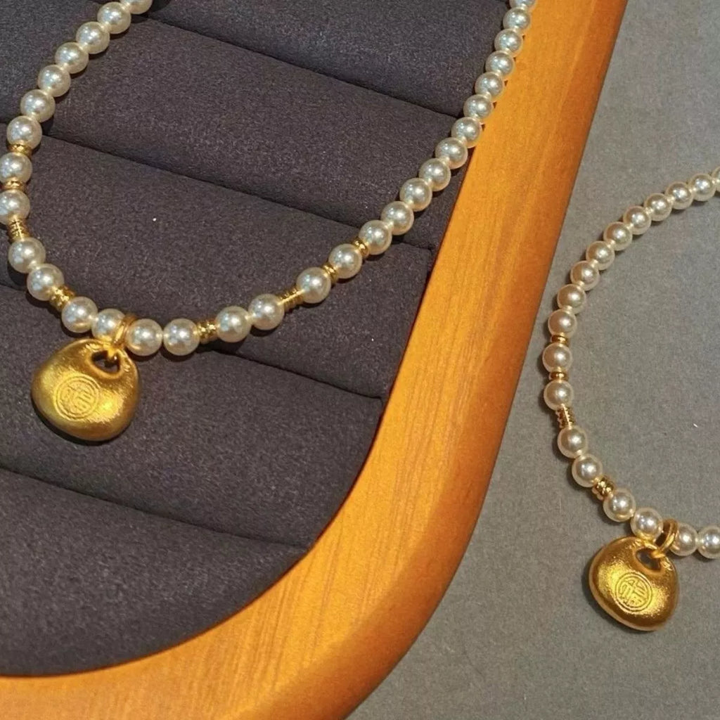 Pearl Necklace with Golden Pendant