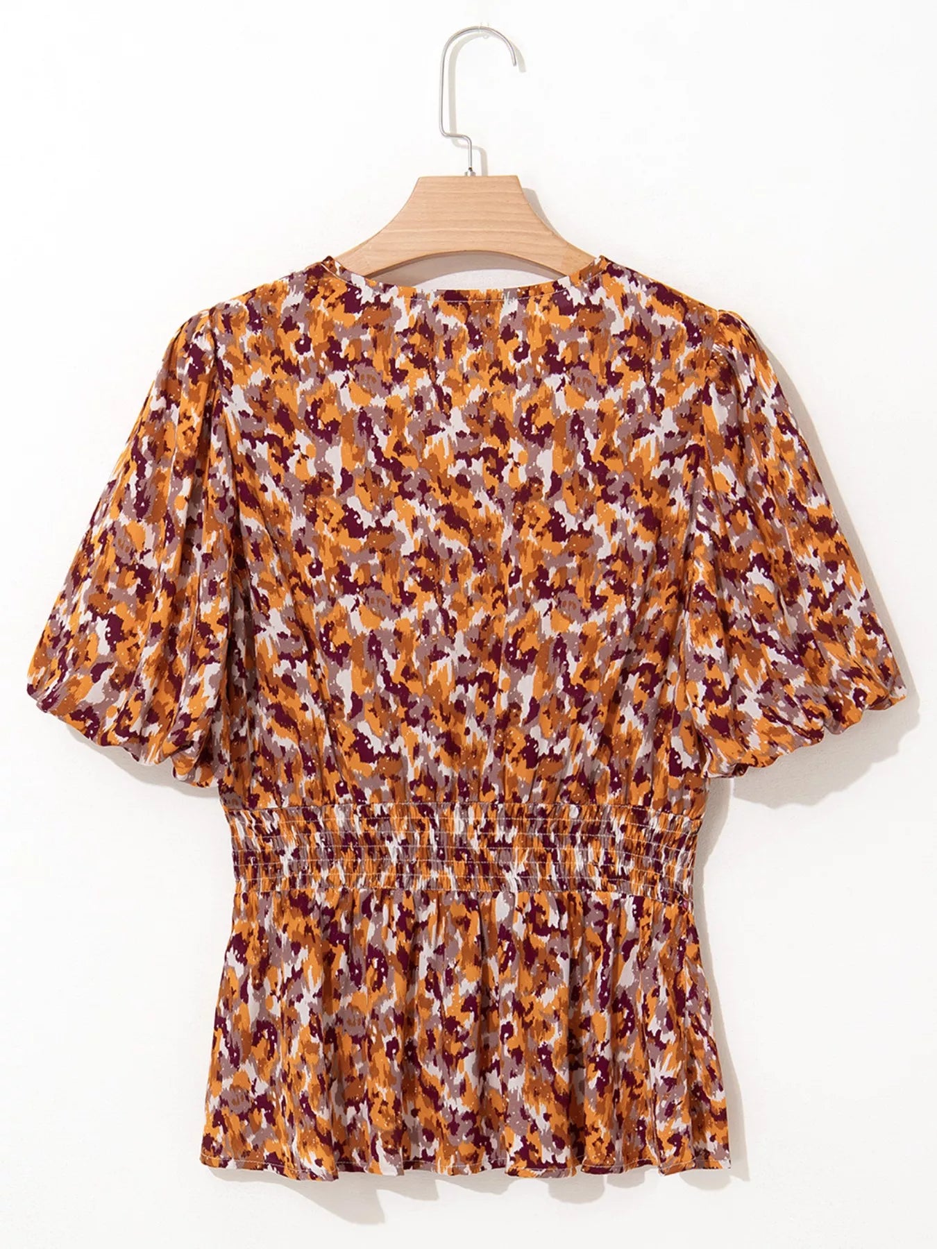 Abstract Print V Neck Smocked Babydoll Blouse