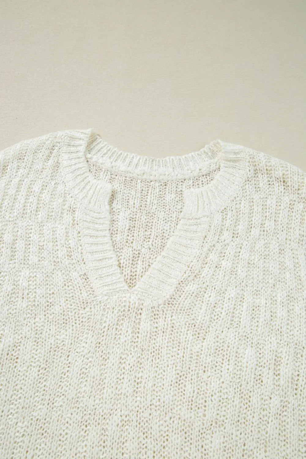 Notched Cap Sleeve Knit Top