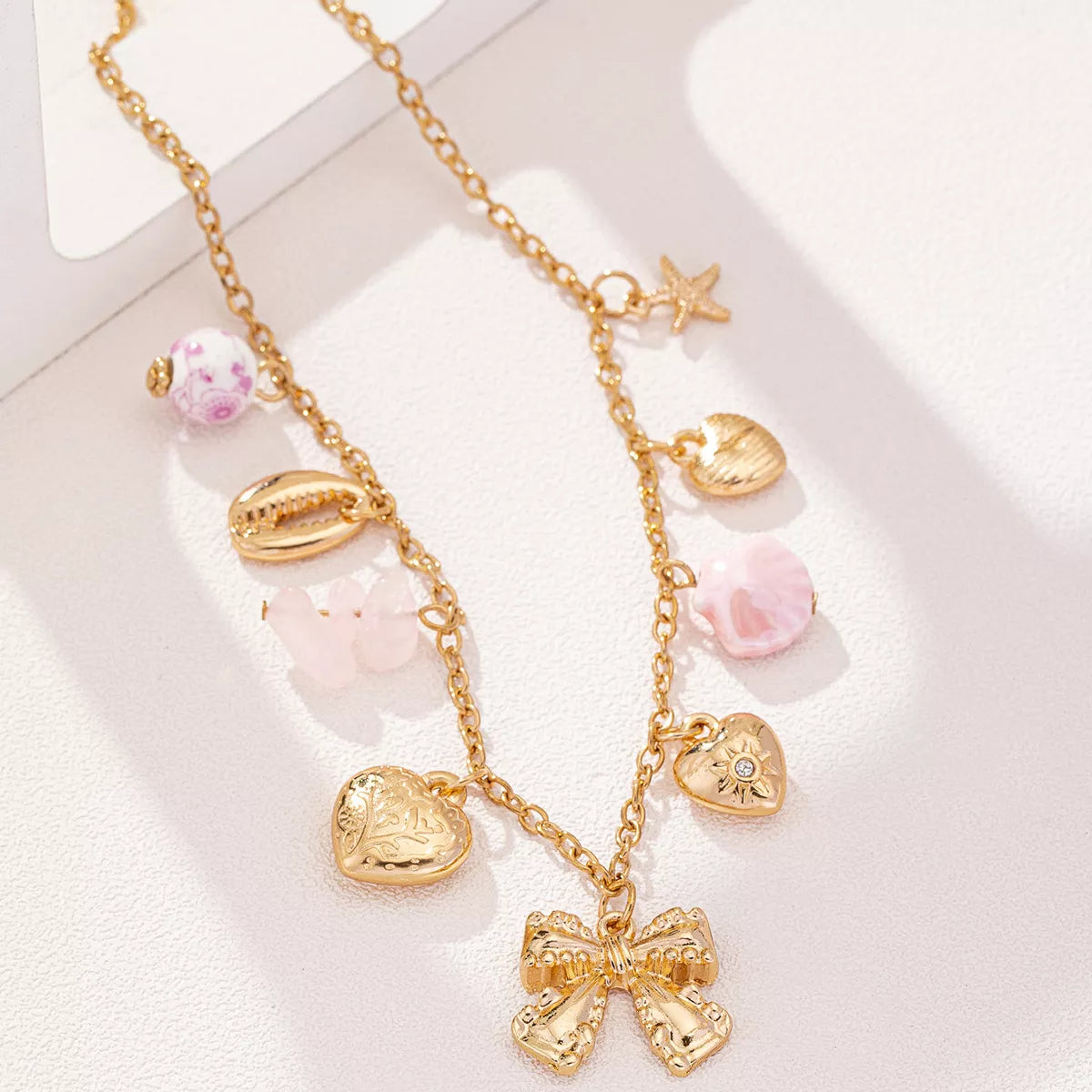 Heart and Butterfly Bow Ocean Multi-Pendant Necklace