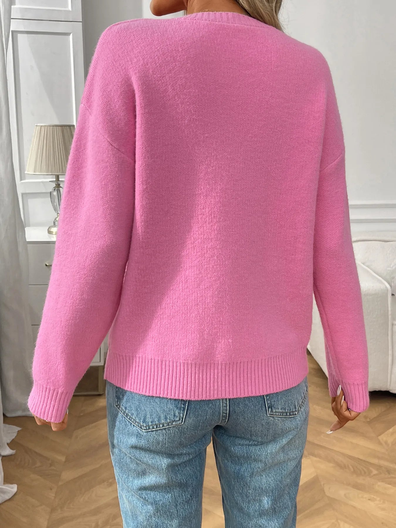 Bow Graphic Ribbed Hem Round Neck Sweater