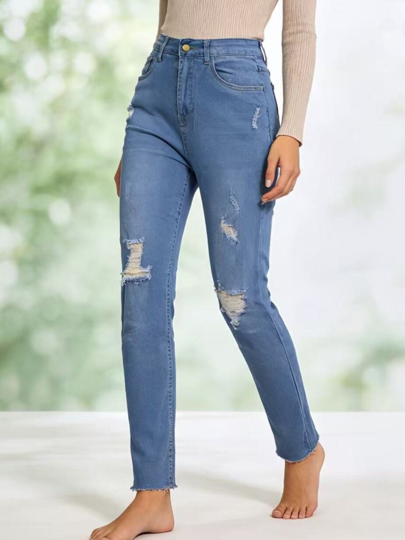 High-Waisted Distressed Jeans