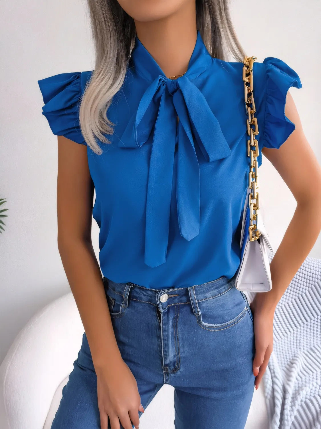 Ruffled Tie Neck Cap Sleeve Blouse