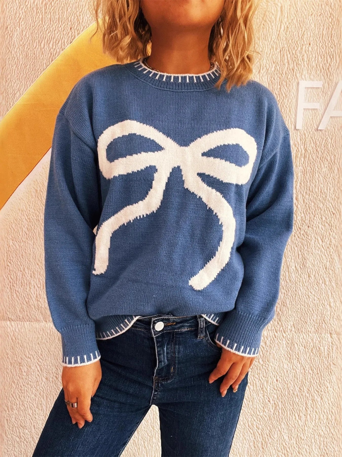 Bow Pattern Round Neck Sweater
