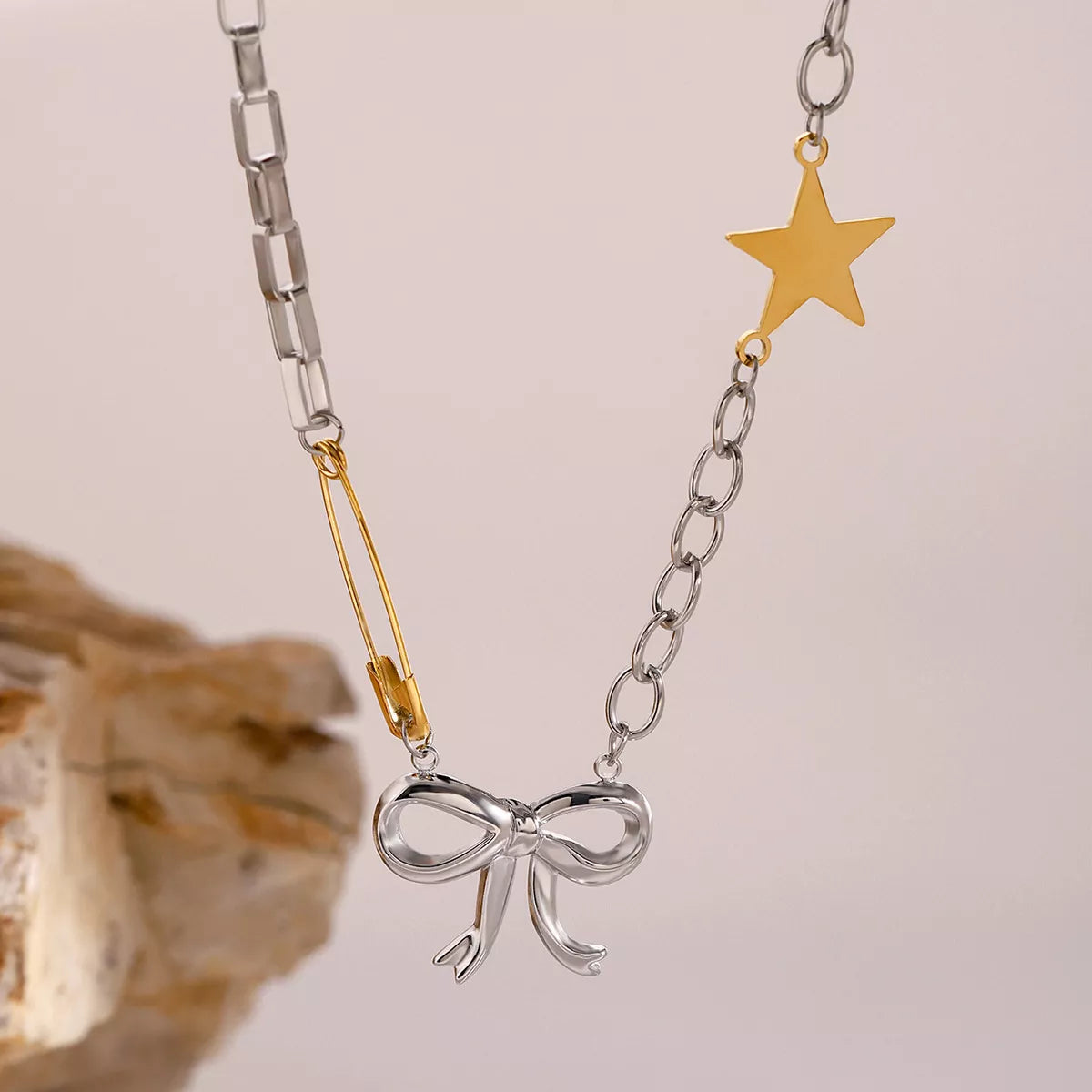 Two-Tone Bow Star Necklace