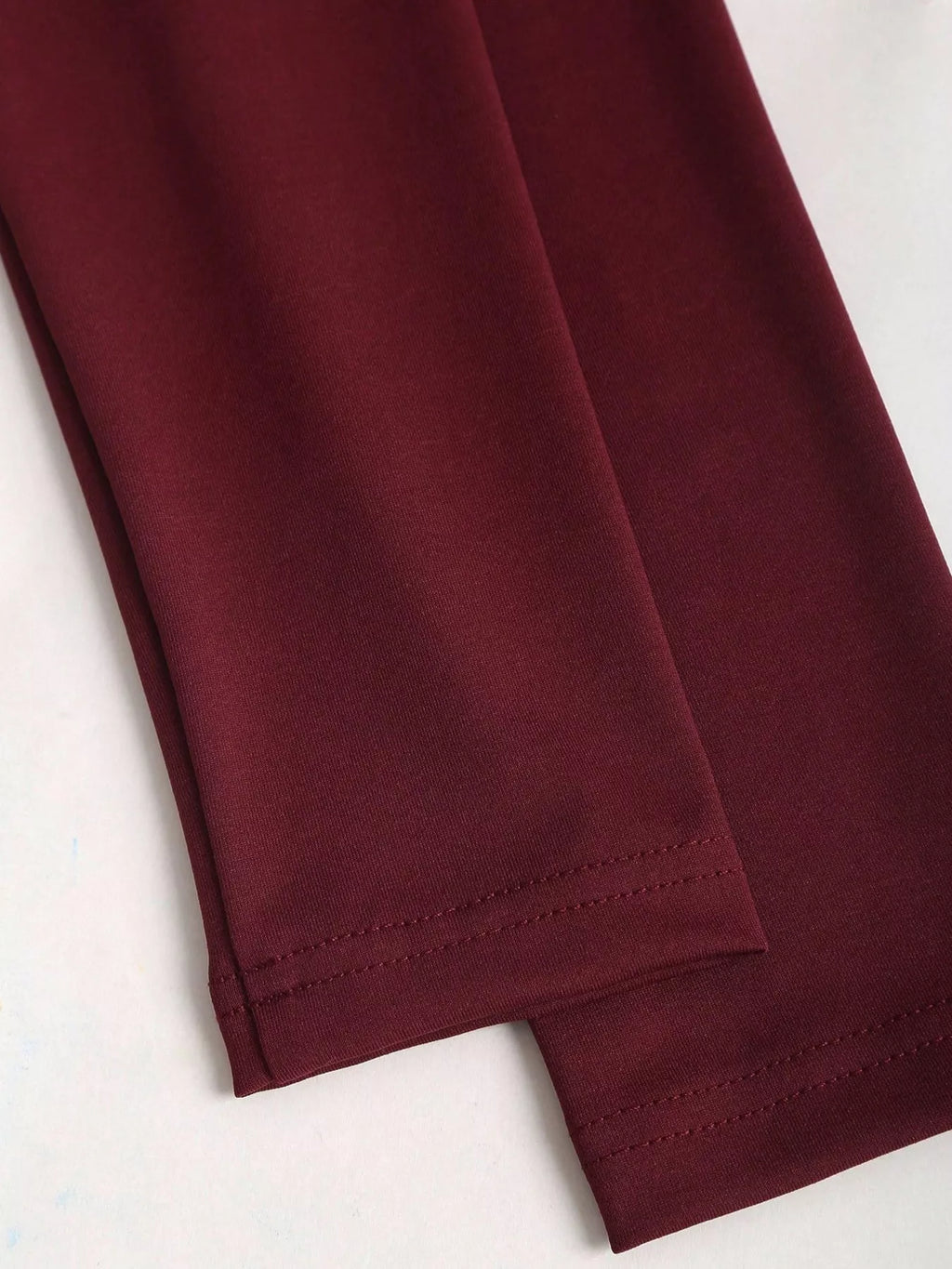 Elegant Ruched Long Sleeve Top with Buckle Detail