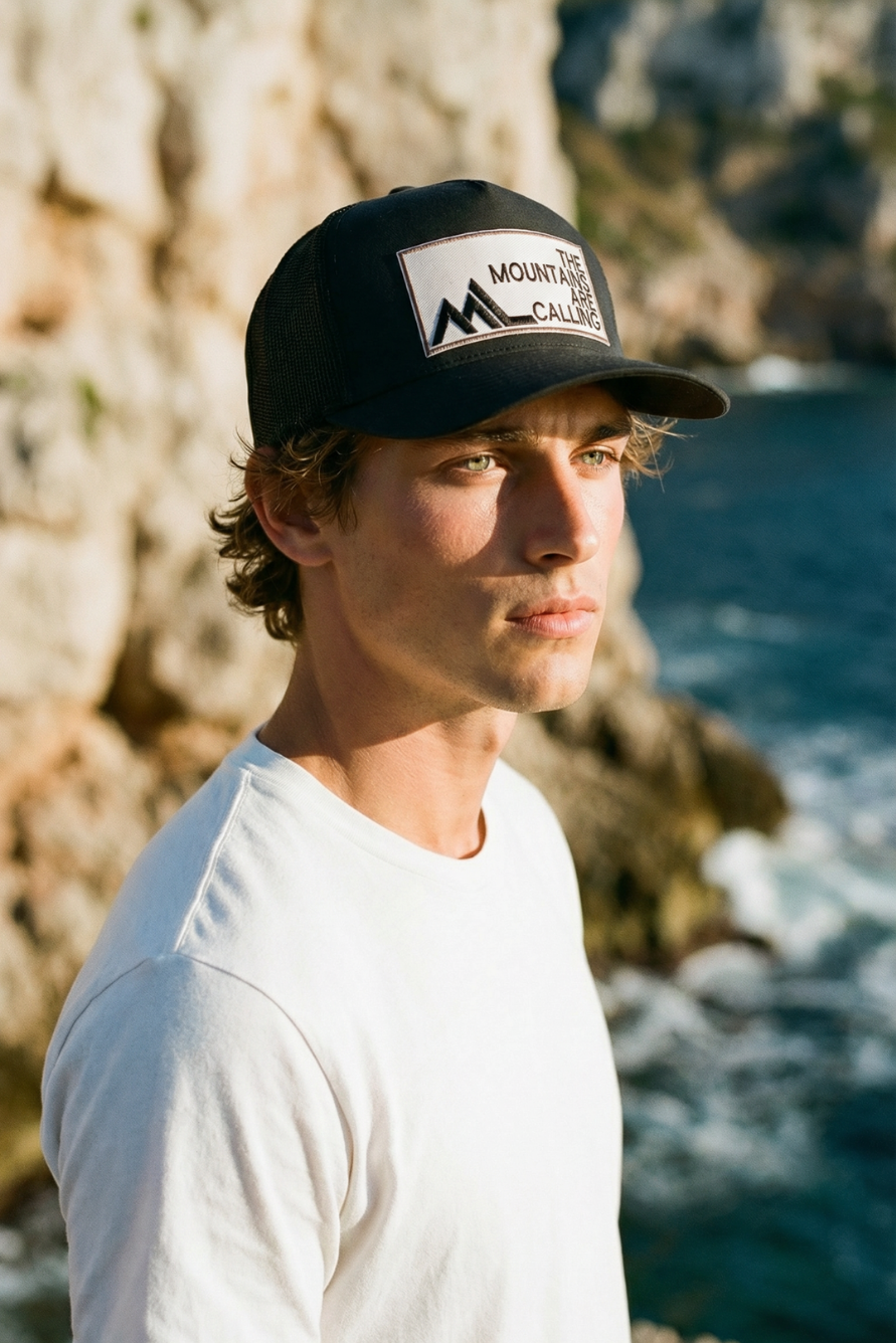 The Mountains Are Calling - Embroidered Patch on Structured Trucker Hat