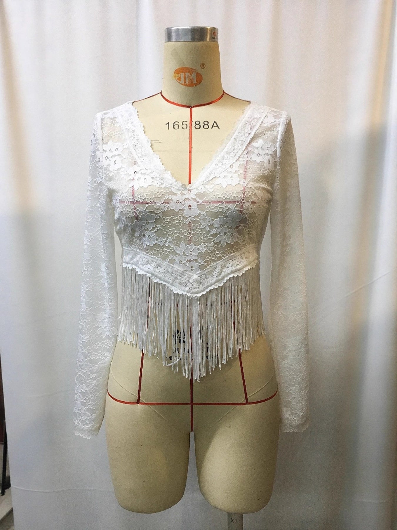 Full Size Fringe Hem Lace Long Sleeve Top Plus Size