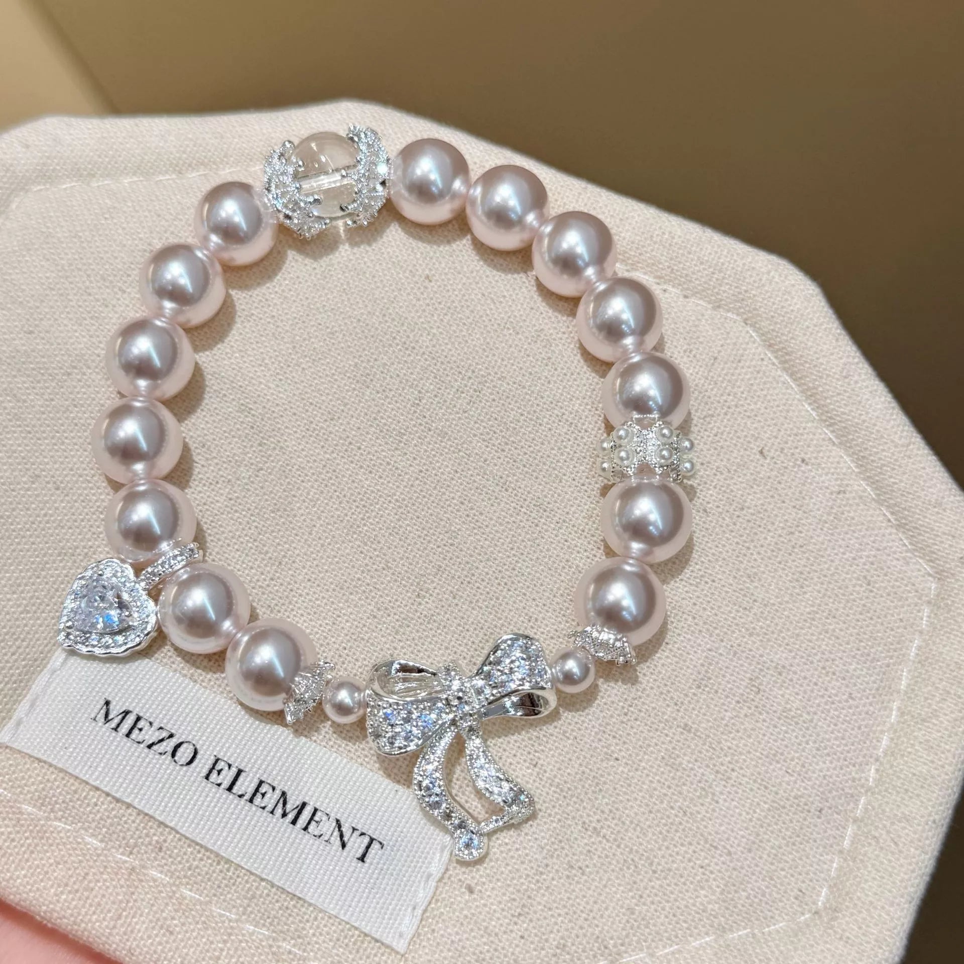Pearl Bracelet with Bow Charm