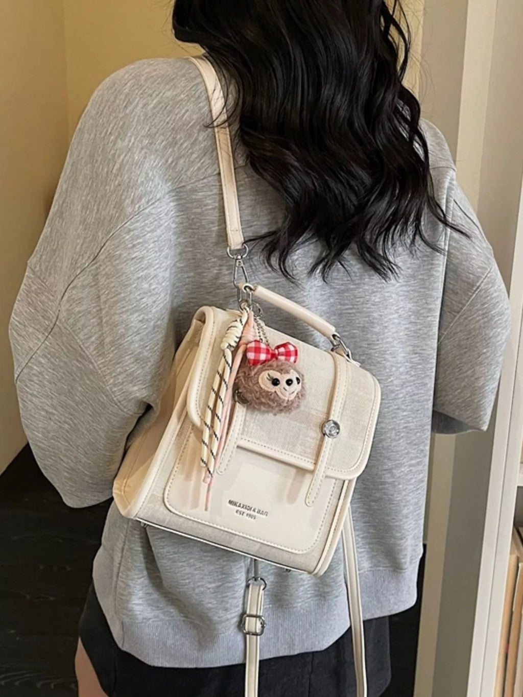 Flap Backpack Bag with Plush Charm