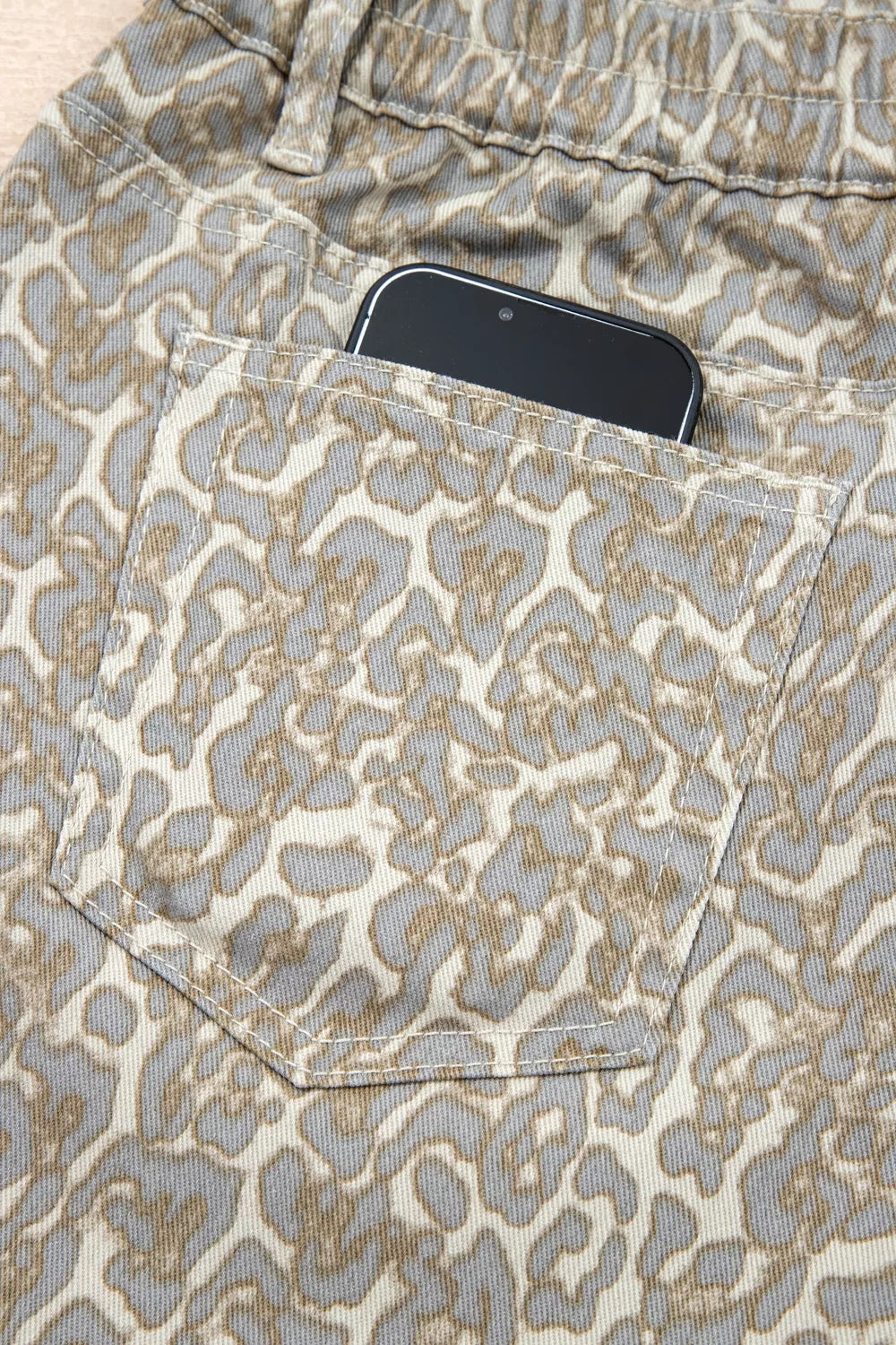 Raw Edge Leopard Print Denim Shorts