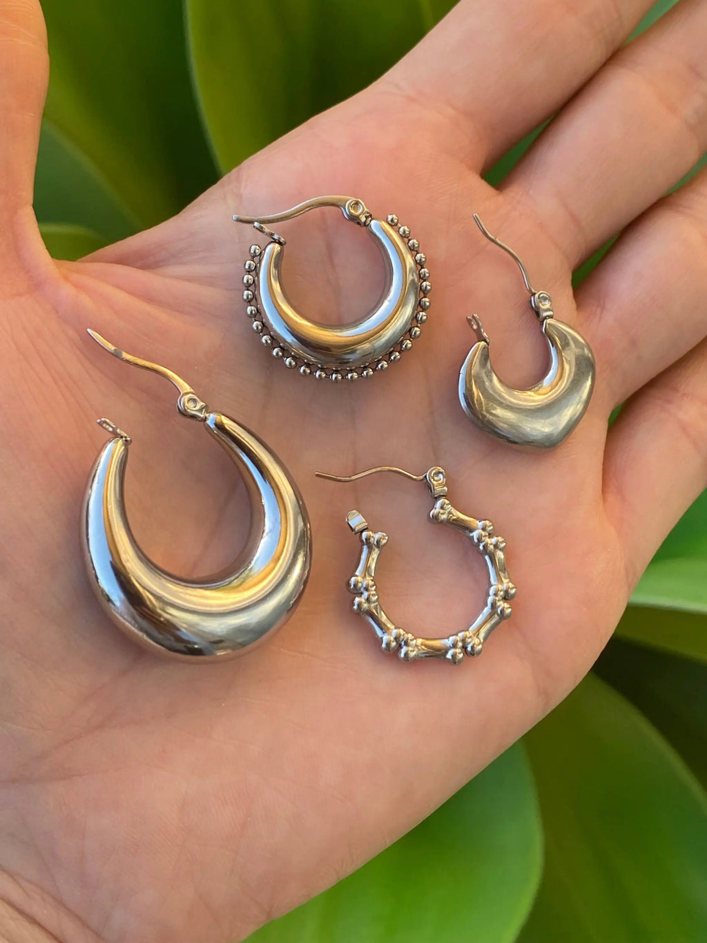 RIVETED MOON HOOPS