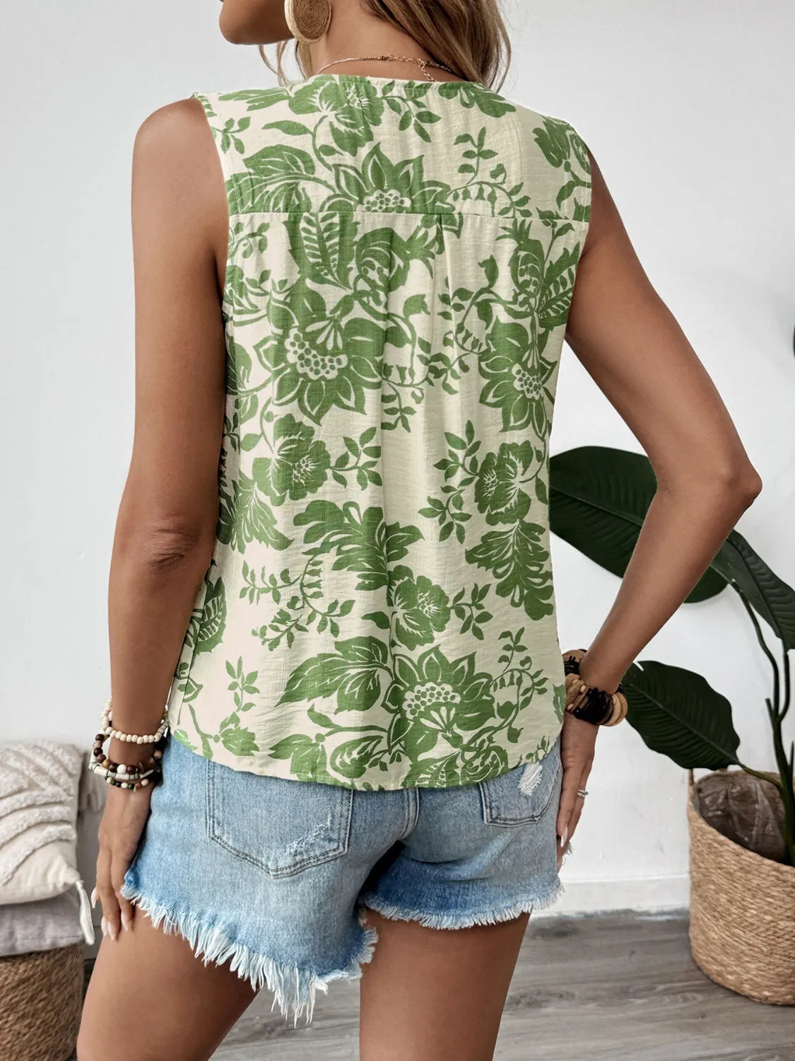 Printed Sleeveless Ruffle Peplum Blouse