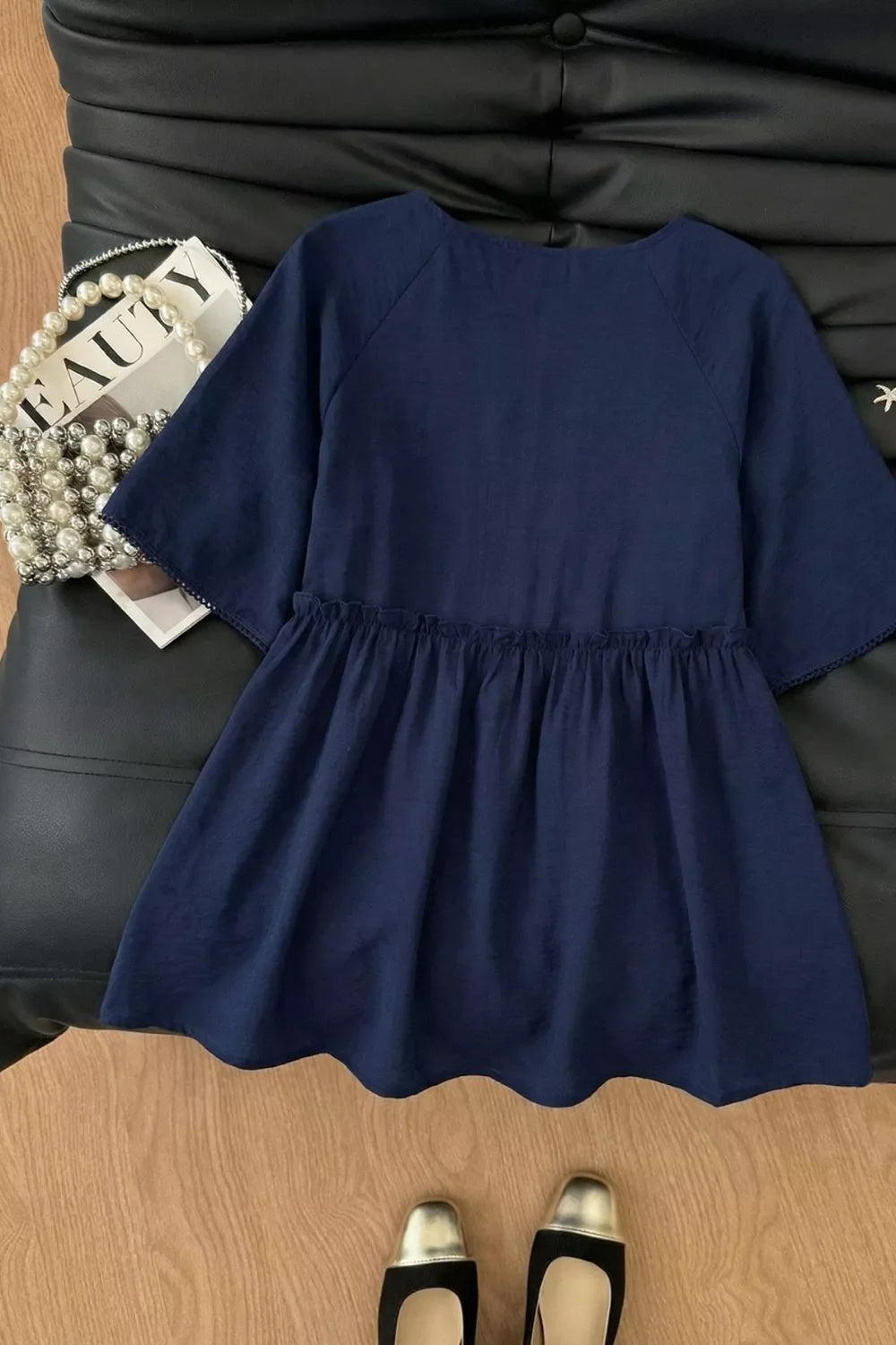 Ruffle Hem Tie Neck Blouse