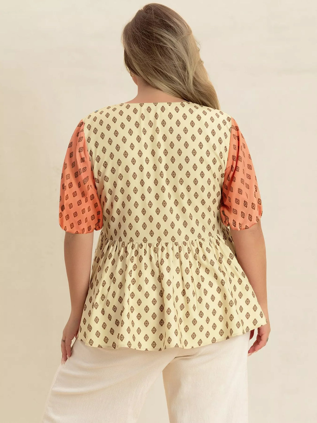 Plus Size Printed Short Sleeve Peplum Blouse