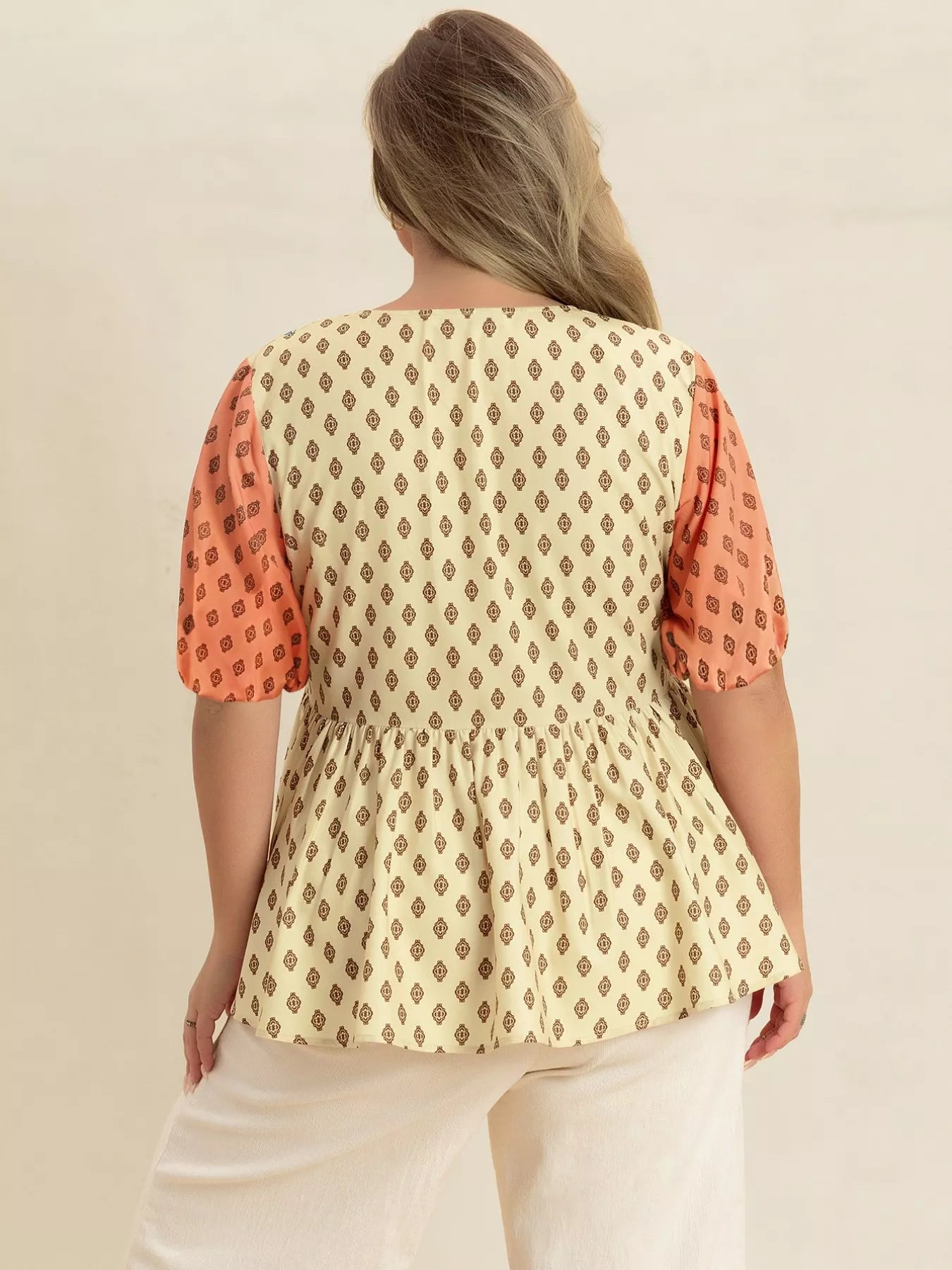 Plus Size Printed Short Sleeve Peplum Blouse