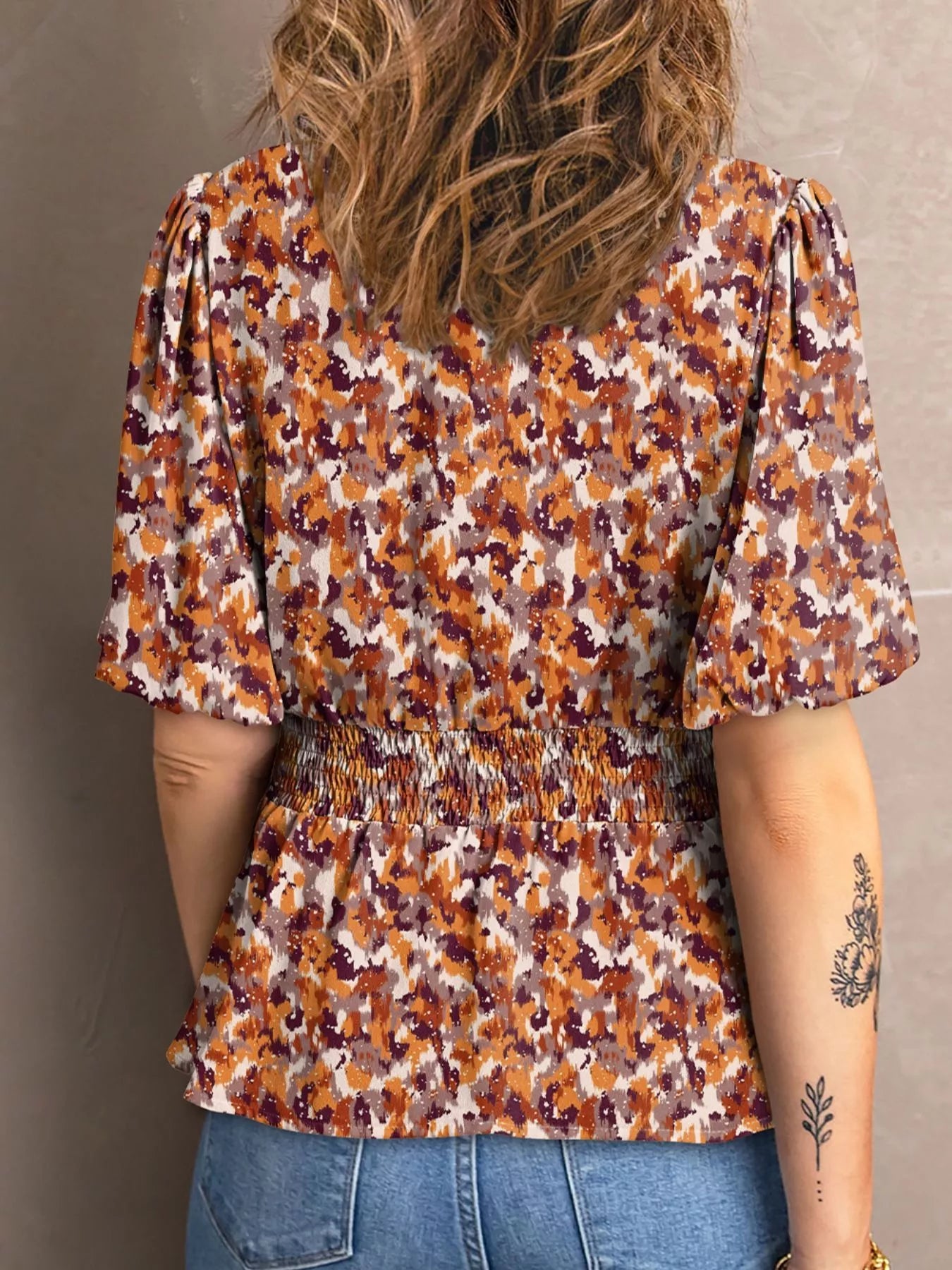 Abstract Print V Neck Smocked Babydoll Blouse