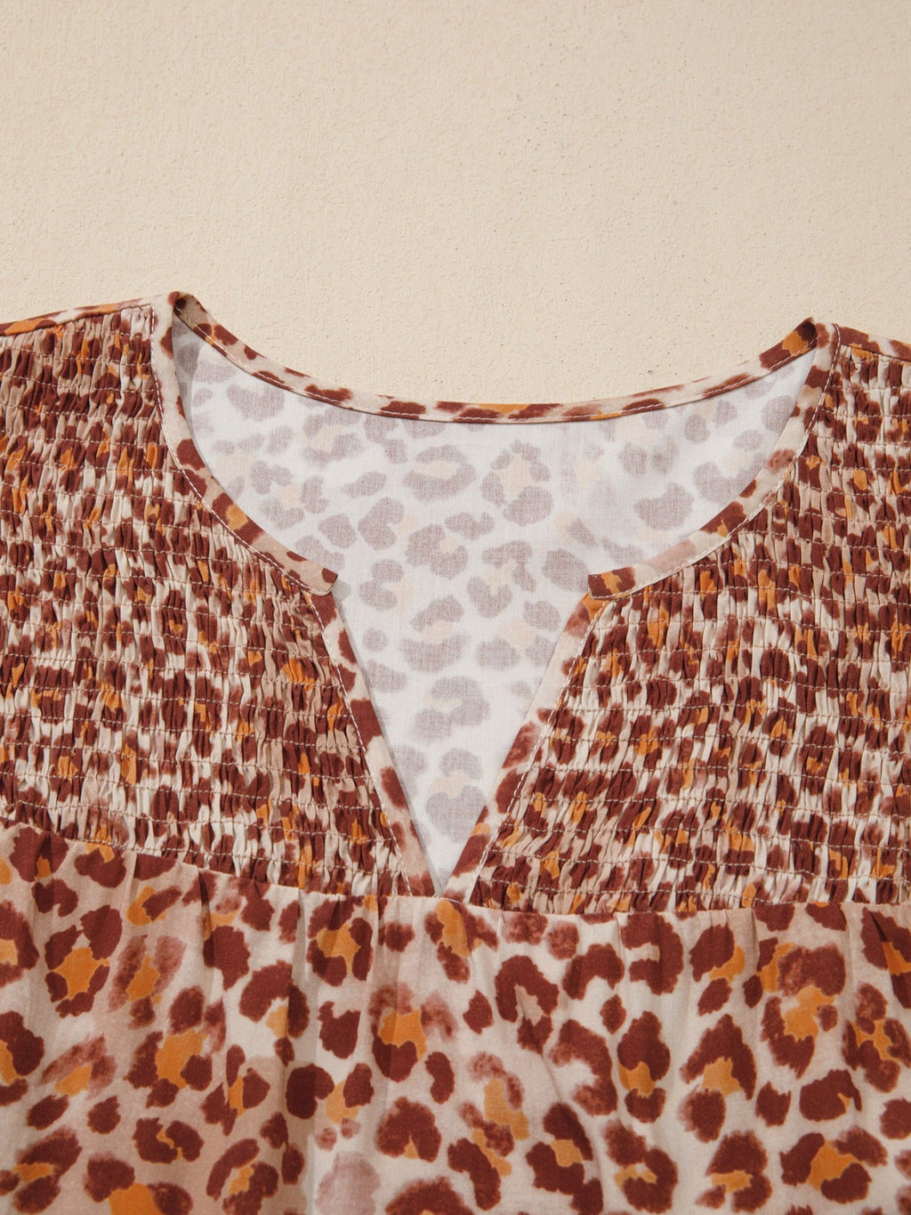 Leopard Print Smocked Notched Blouse