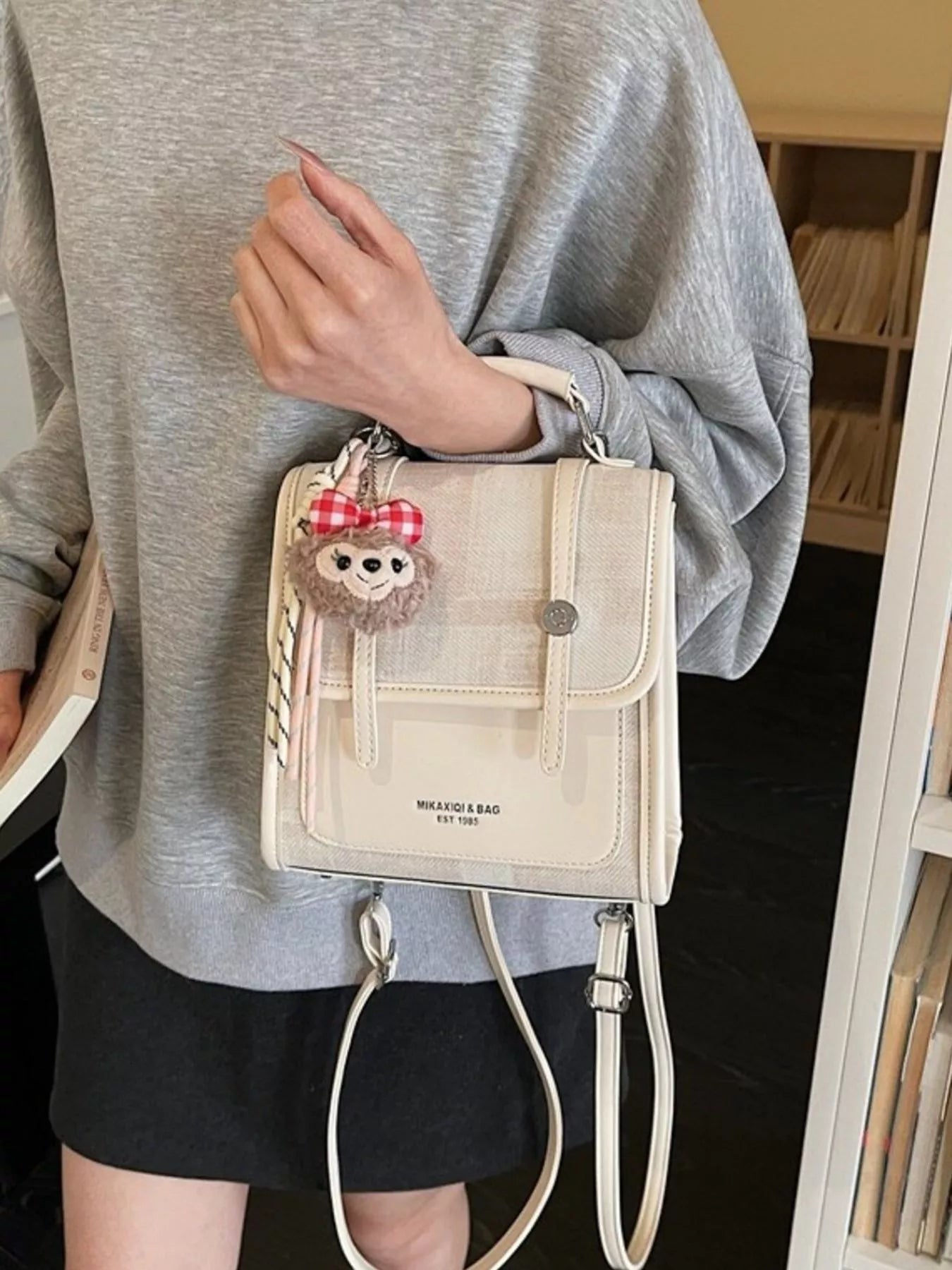 Flap Backpack Bag with Plush Charm