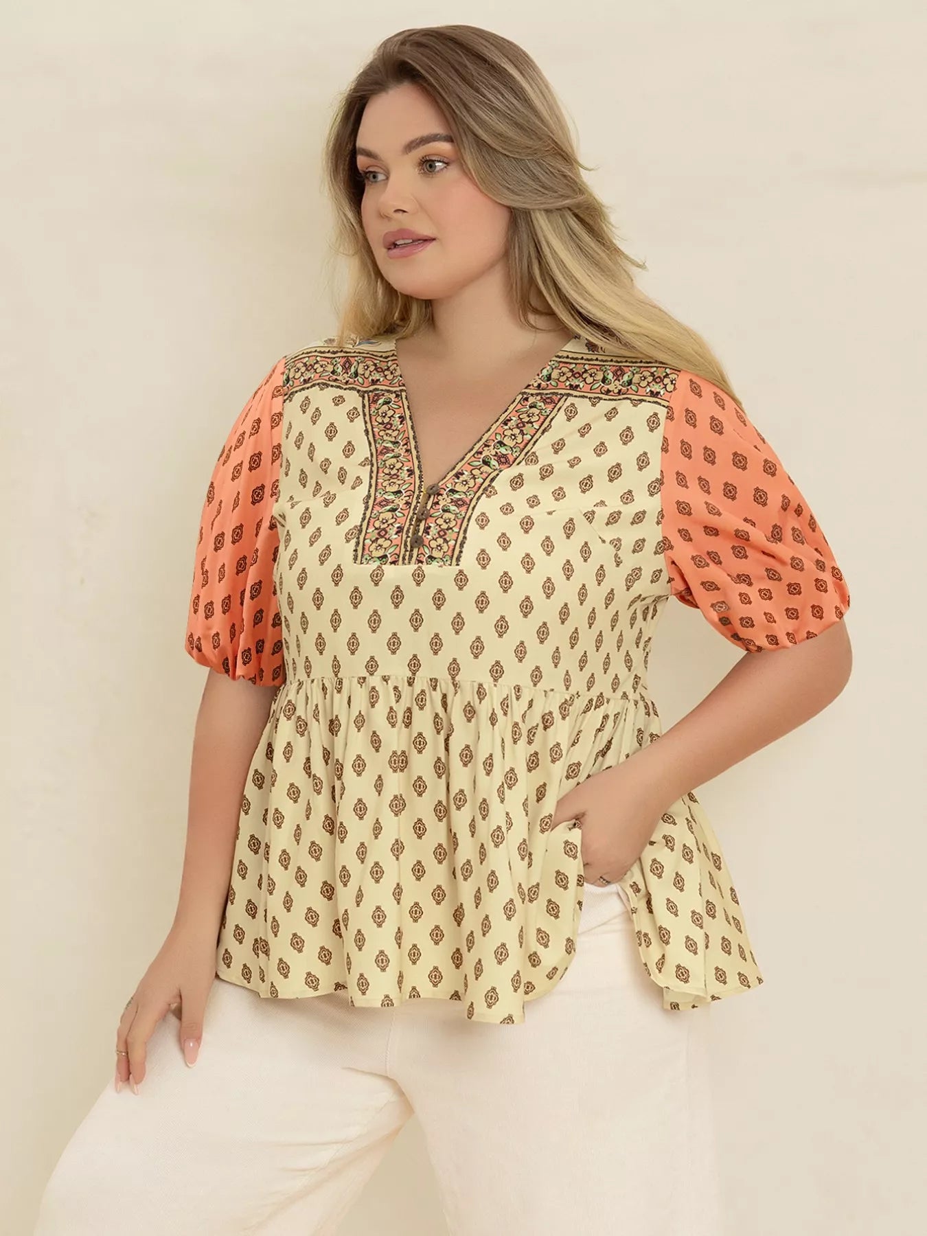 Plus Size Printed Short Sleeve Peplum Blouse