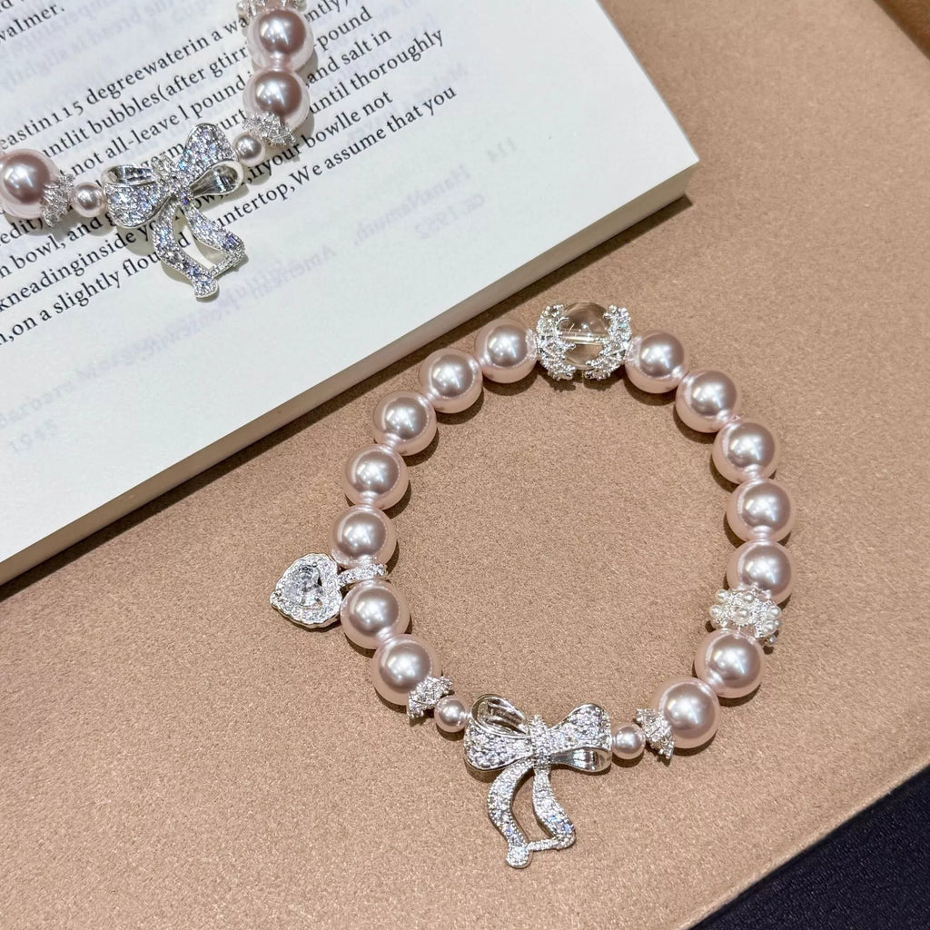 Pearl Bracelet with Bow Charm