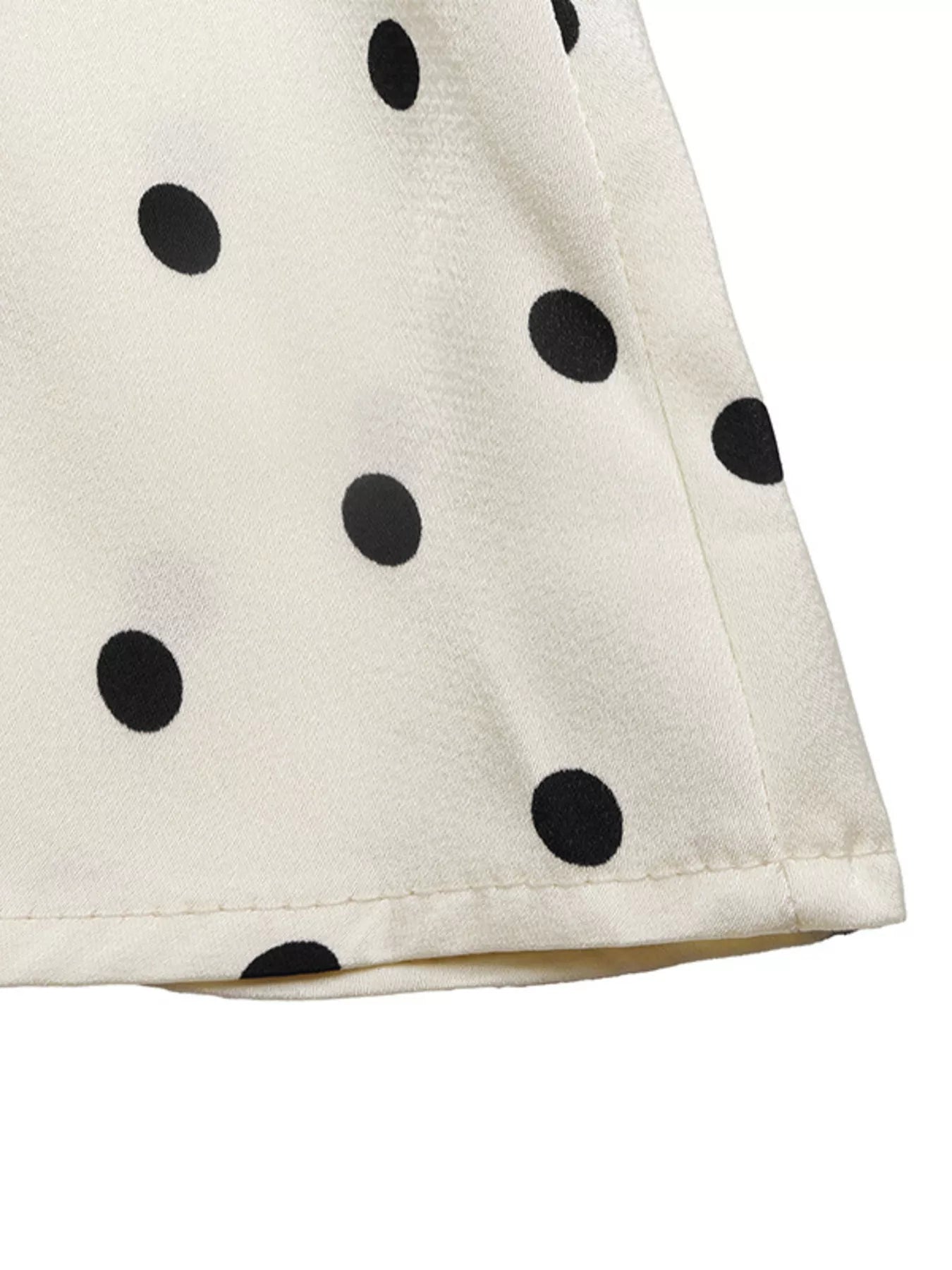 Polka Dot Sleeveless Peplum Blouse