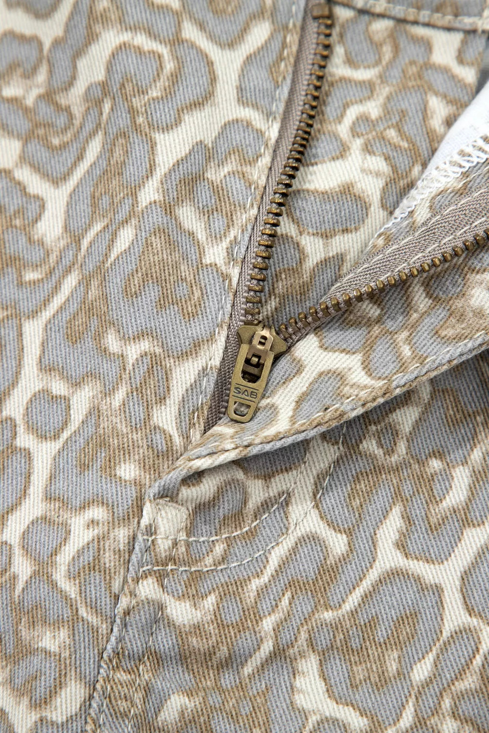 Raw Edge Leopard Print Denim Shorts