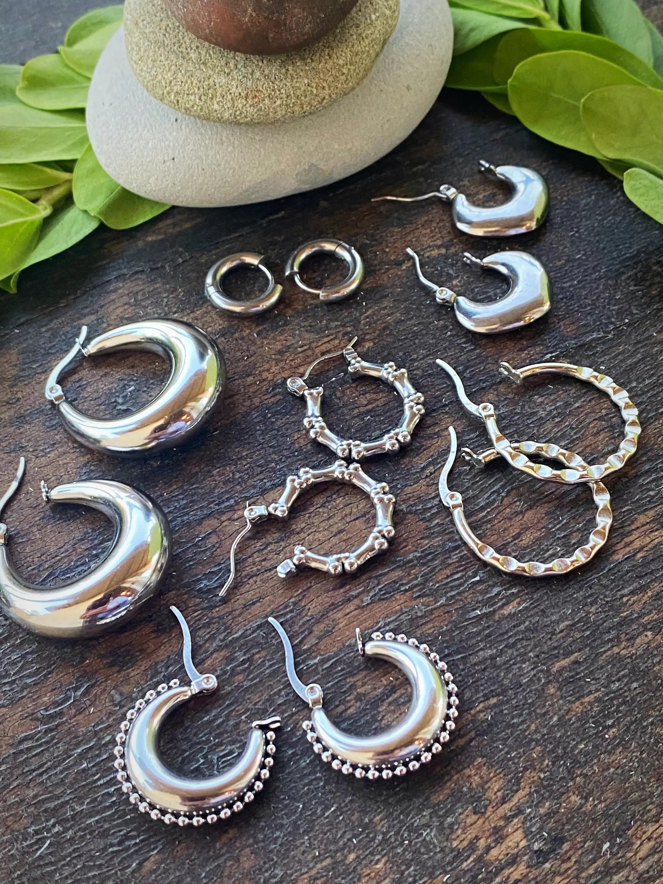 RIVETED MOON HOOPS