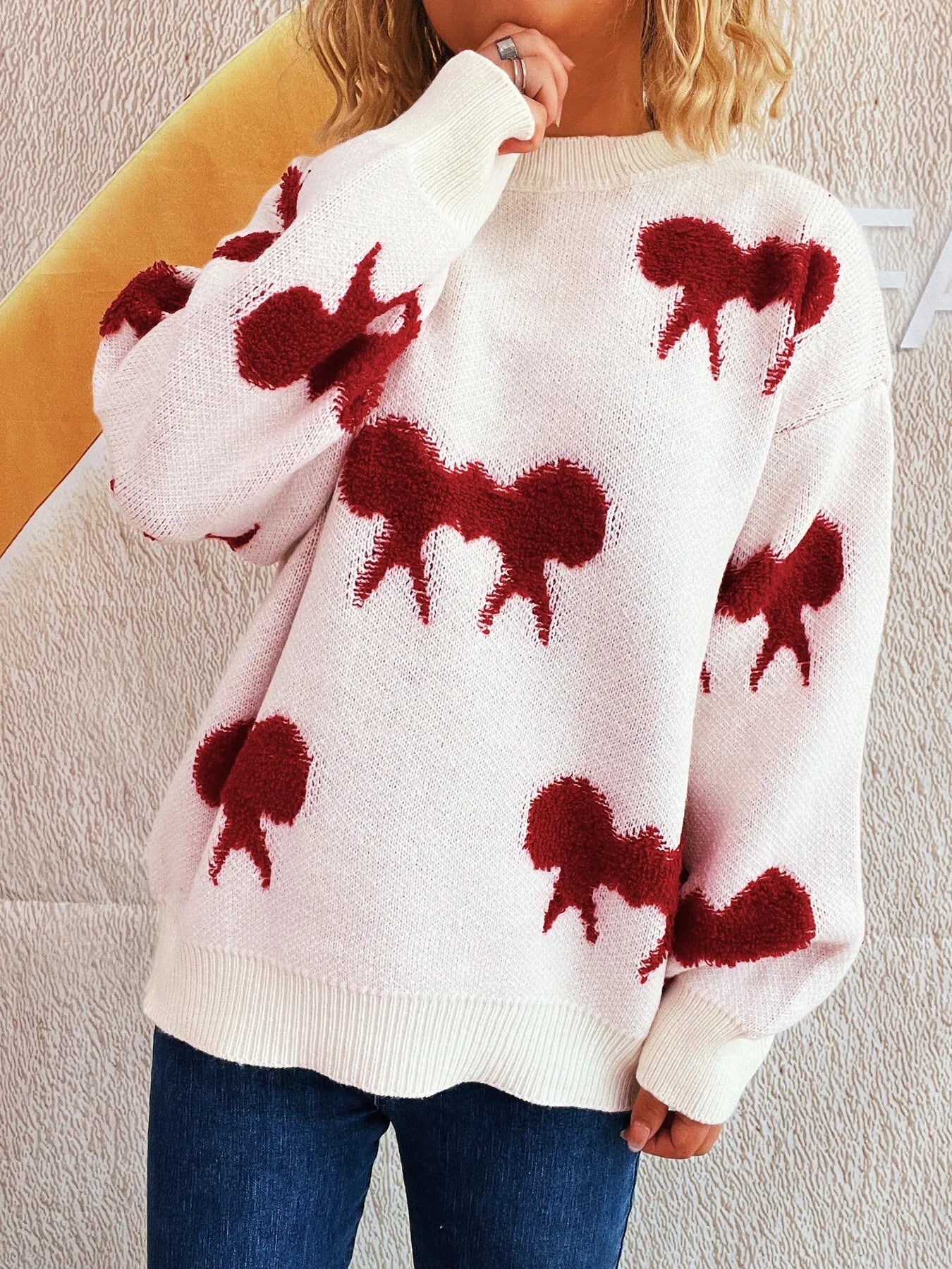 Bow Pattern Round Neck Sweater