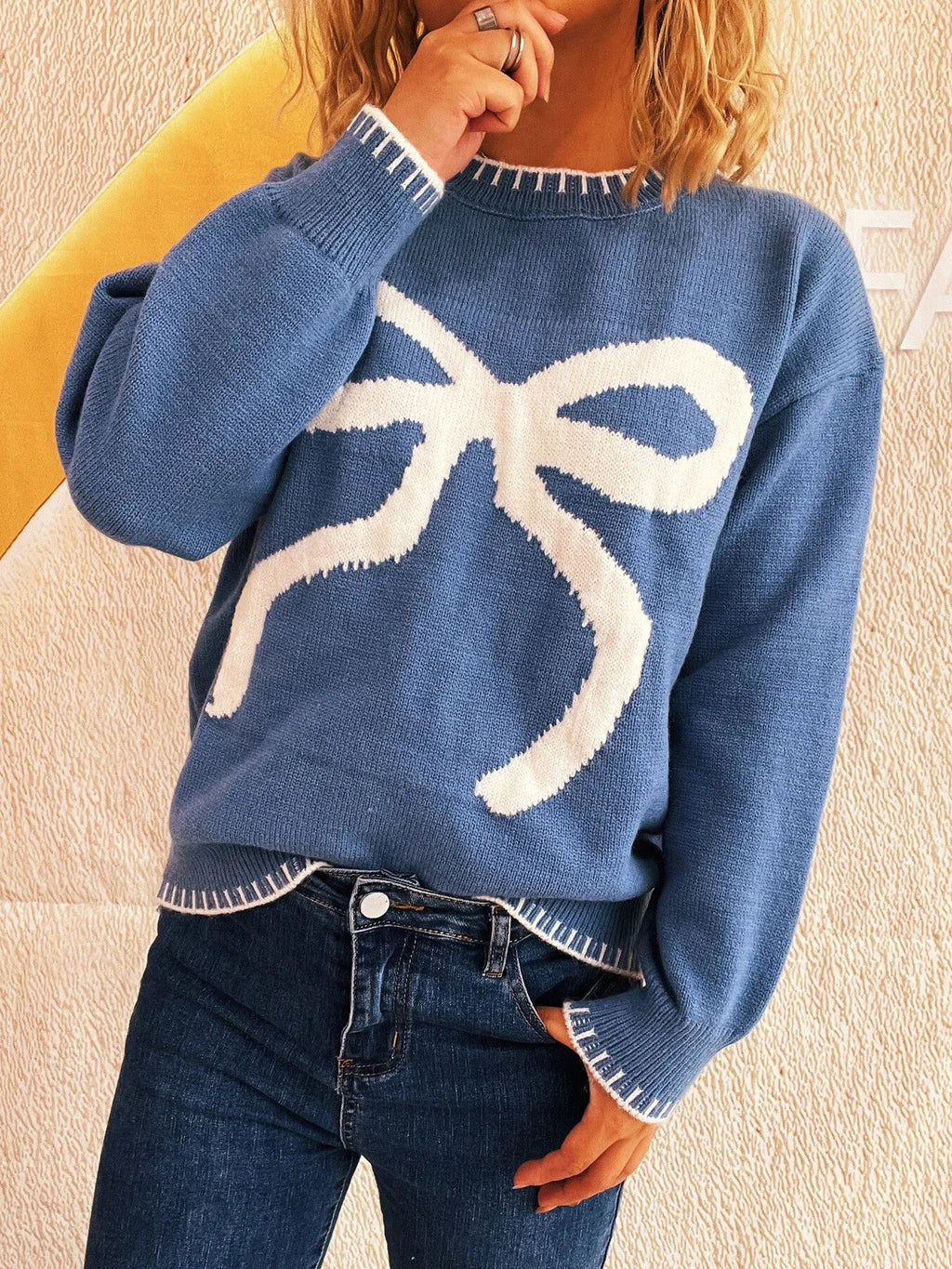 Bow Pattern Round Neck Sweater