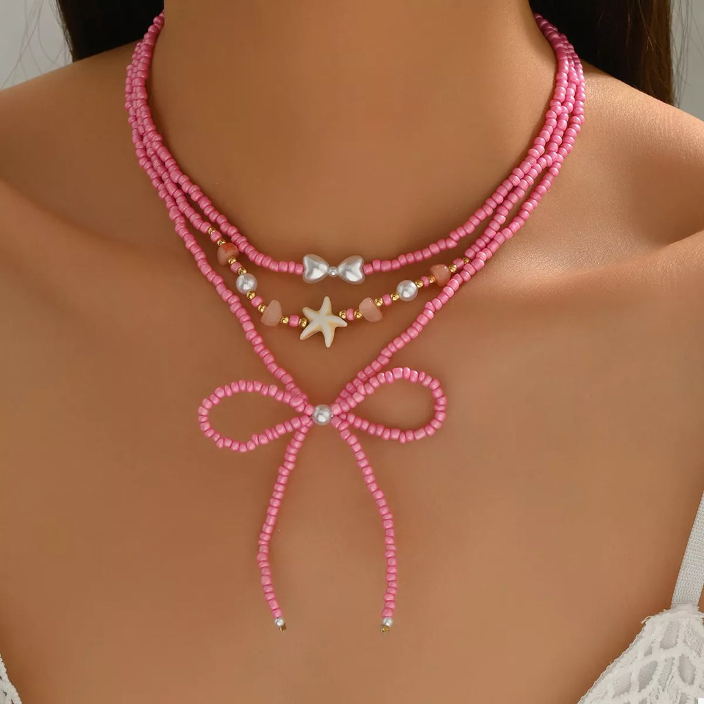 Beaded Three-Layered Necklace with Bow and Starfish Charms