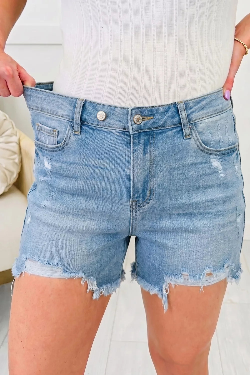 Asymmetric Raw Hem Distressed Whiskery Denim Shorts