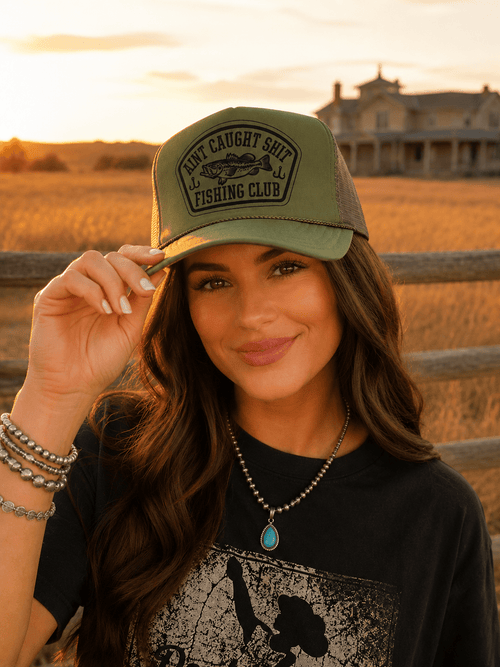 Aint Caught Shit Fishing Club Trucker Hat