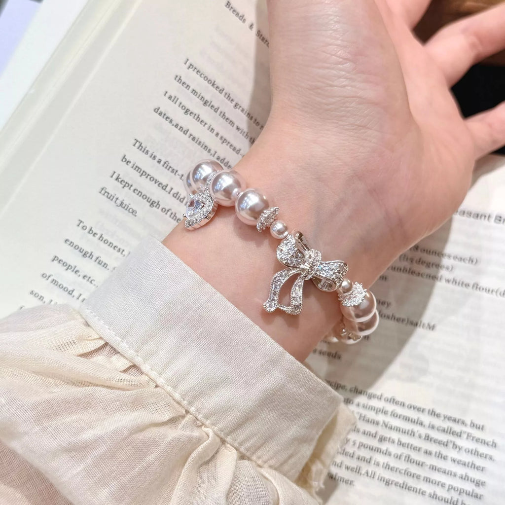 Pearl Bracelet with Bow Charm
