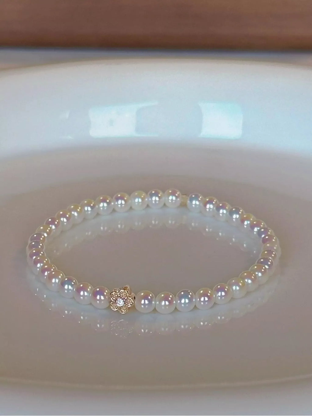 Pearl Bracelet with Floral Accent