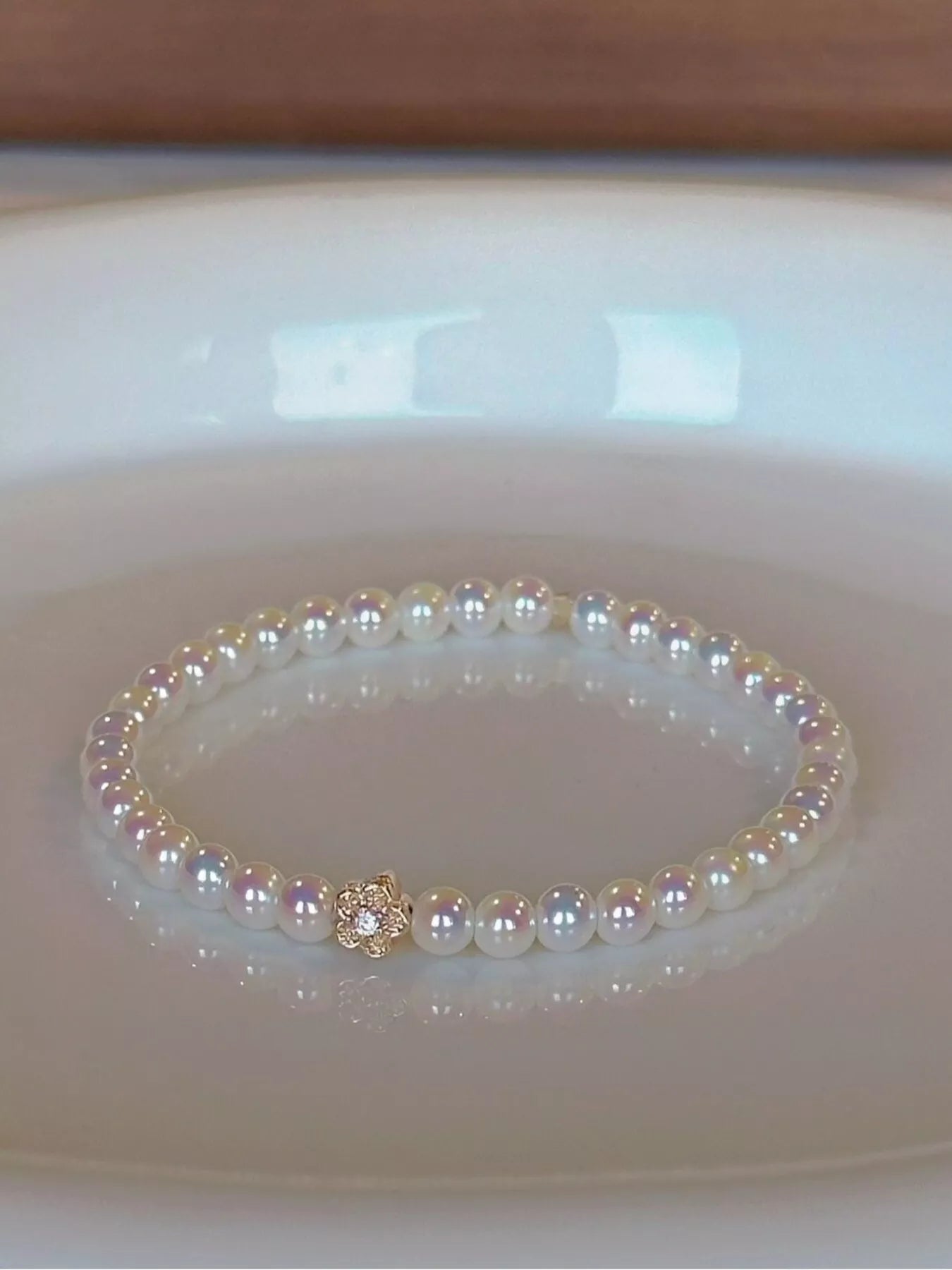Pearl Bracelet with Floral Accent