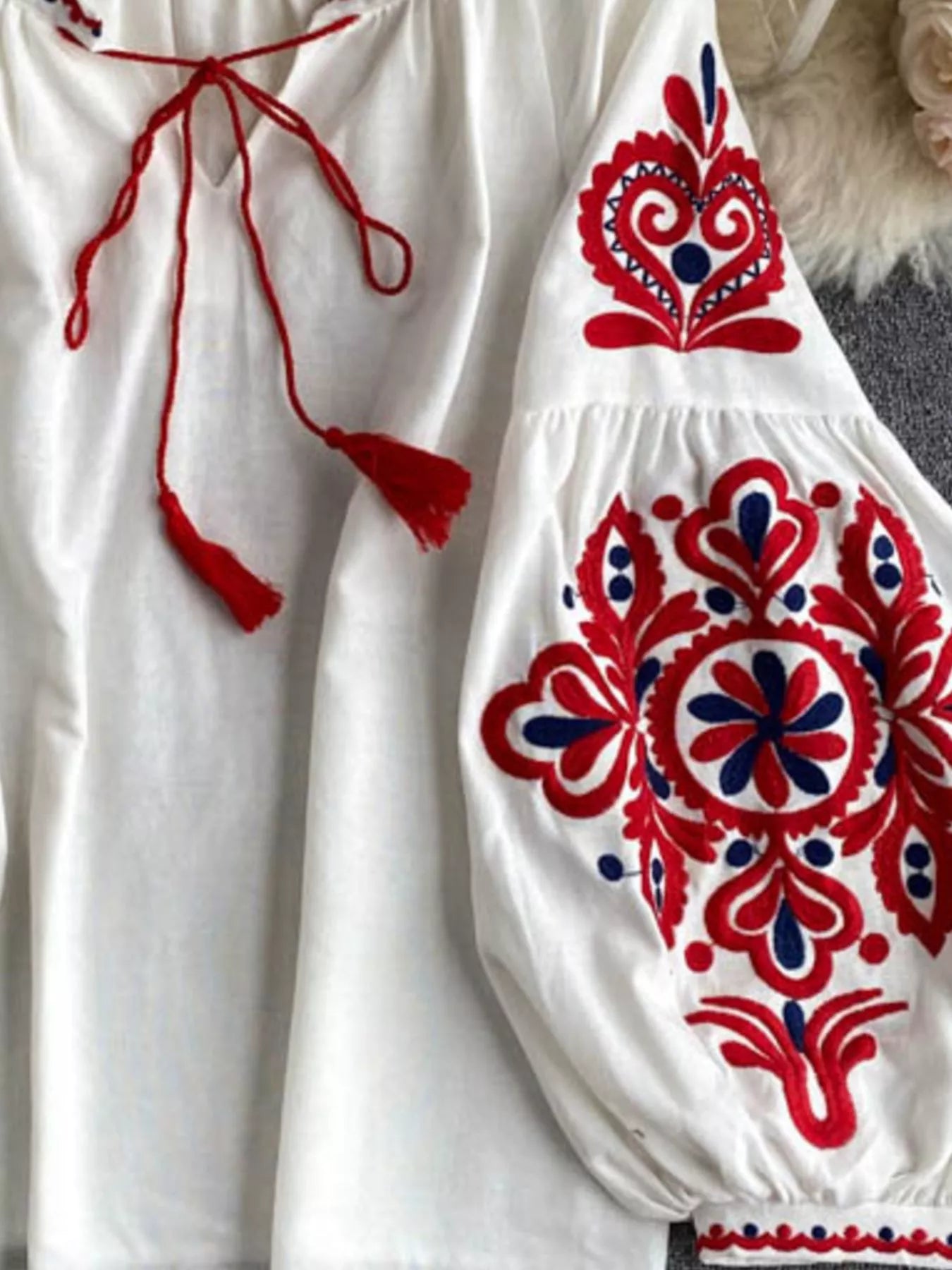 Embroidered Tassel Tie Neck Blouse