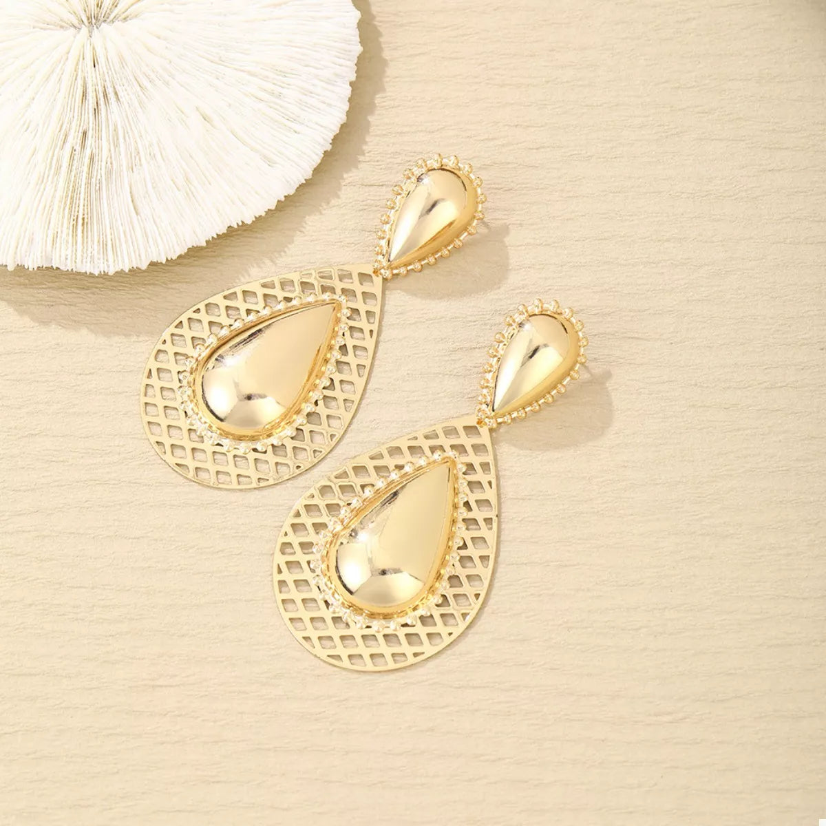 Hollowed-Out Teardrop Statement Earrings