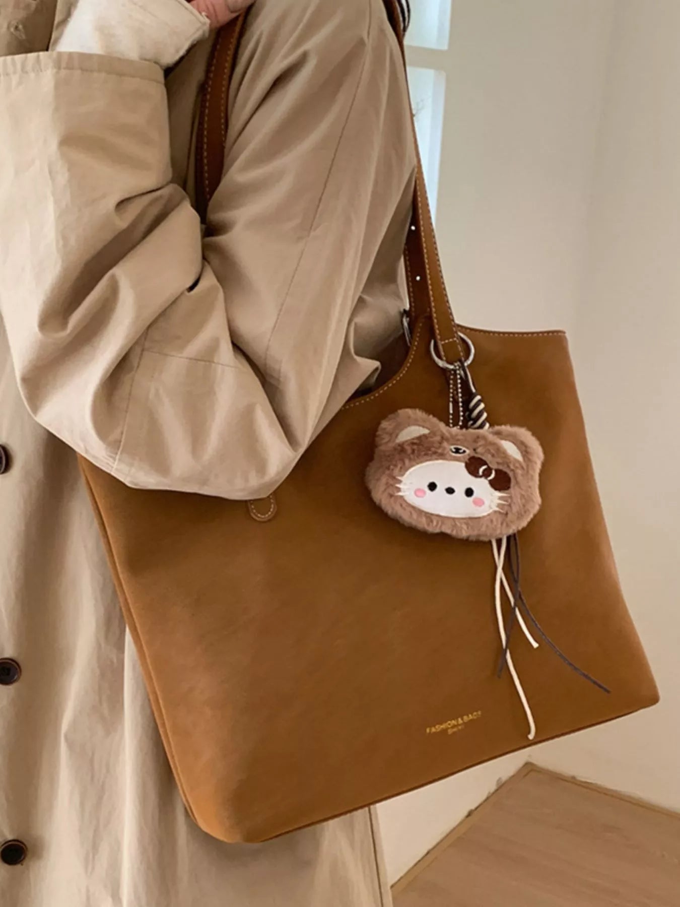 Solid Color Handbag with Plush Charm