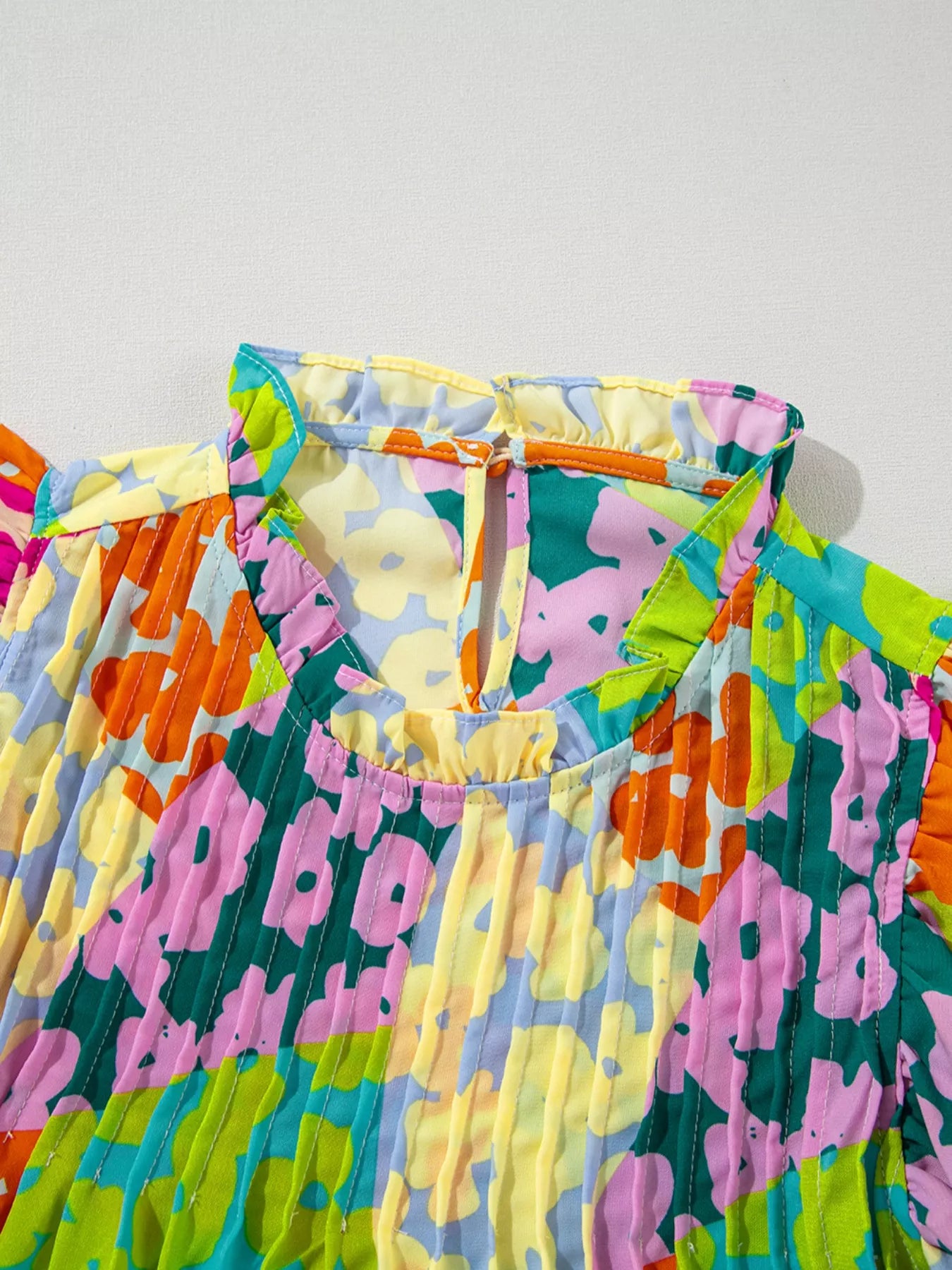 Printed Ruffled Cap Sleeve Blouse